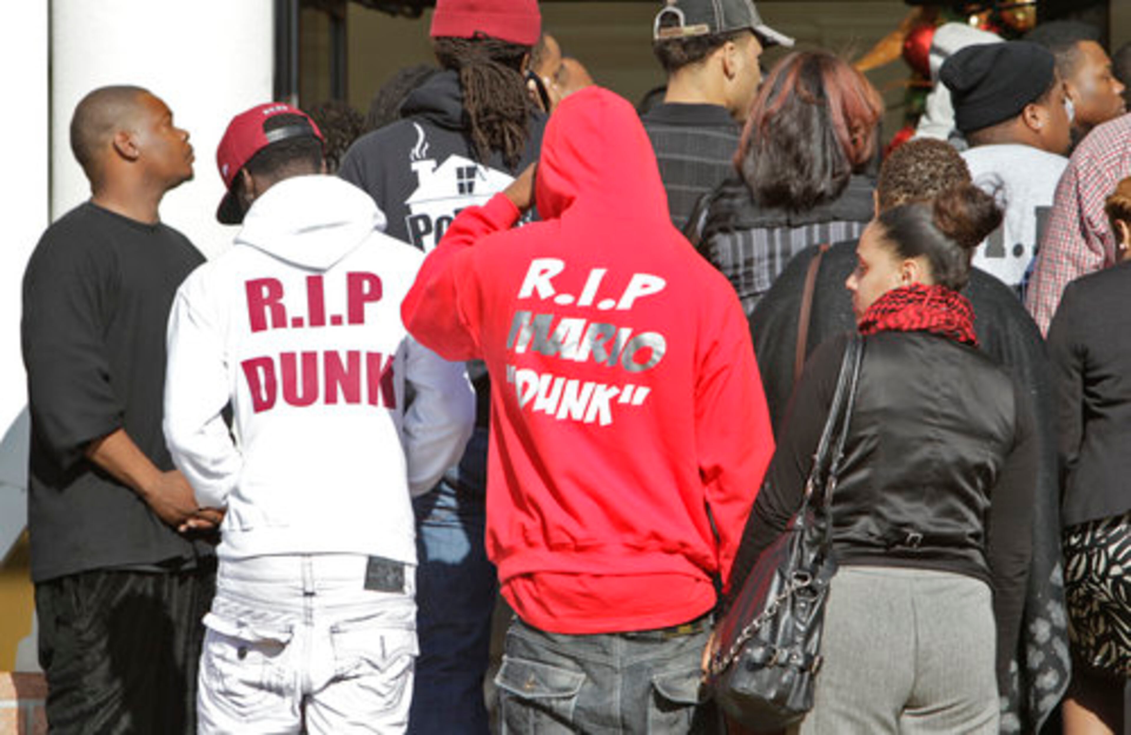 Some mourners wore "R.I.P. Dunk" sweatshirts.