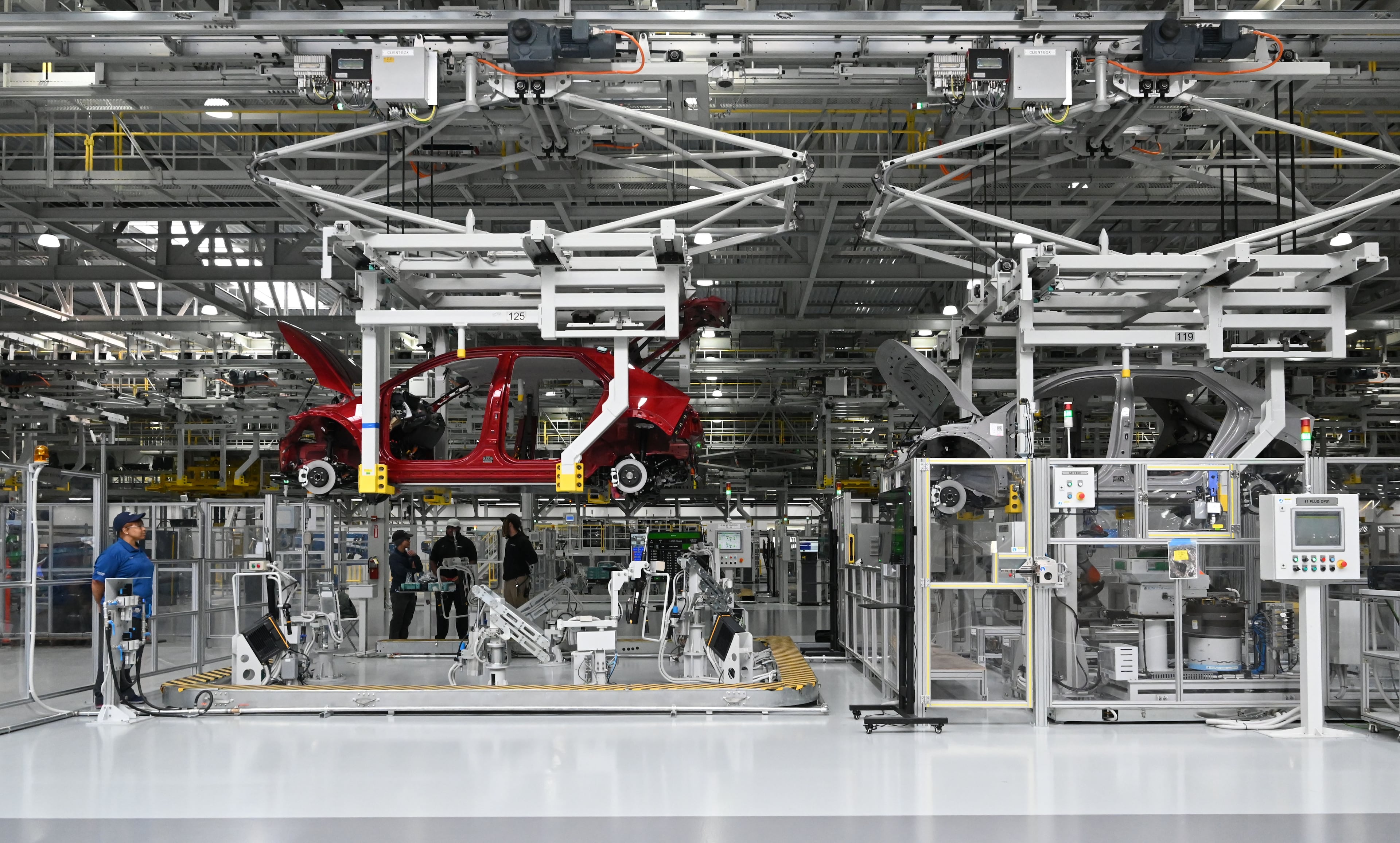 Hyundai IONIQ 5 electric vehicles advance to the next stage of the assembly line at the automaker’s Metaplant in Ellabell. If Hyundai expands the production goal to 800,000 vehicle each year, it would become America’s largest vehicle assembly operation by capacity. (Hyosub Shin/AJC)