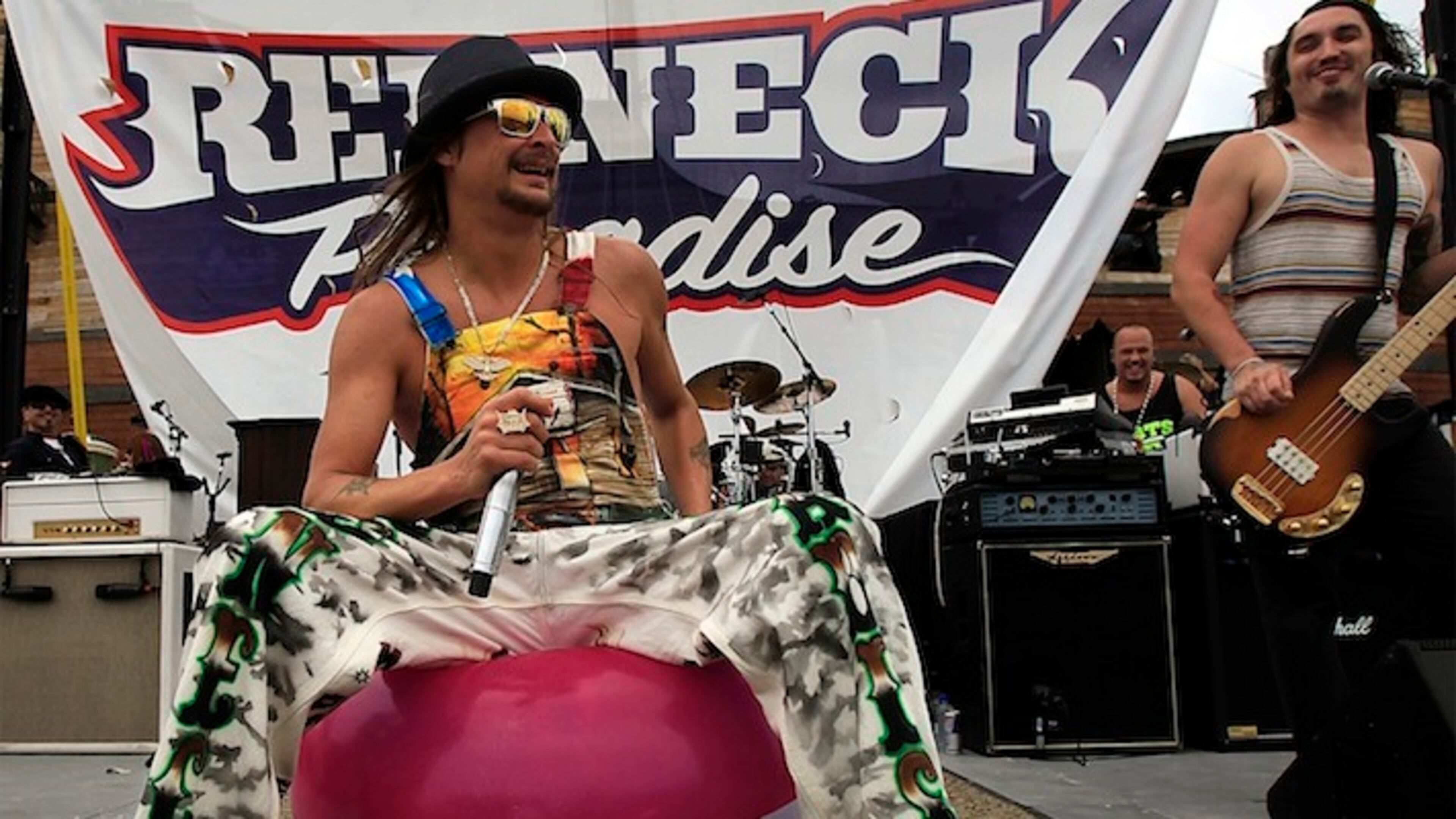 Kid Rock playfully sits on a large beachball that floated onstage during his performance at Half Moon Cay, which was rechristened "Redneck Paradise" by the Detroit based star and his tour organizers. (Luis Sinco/Los Angeles Times/TNS)