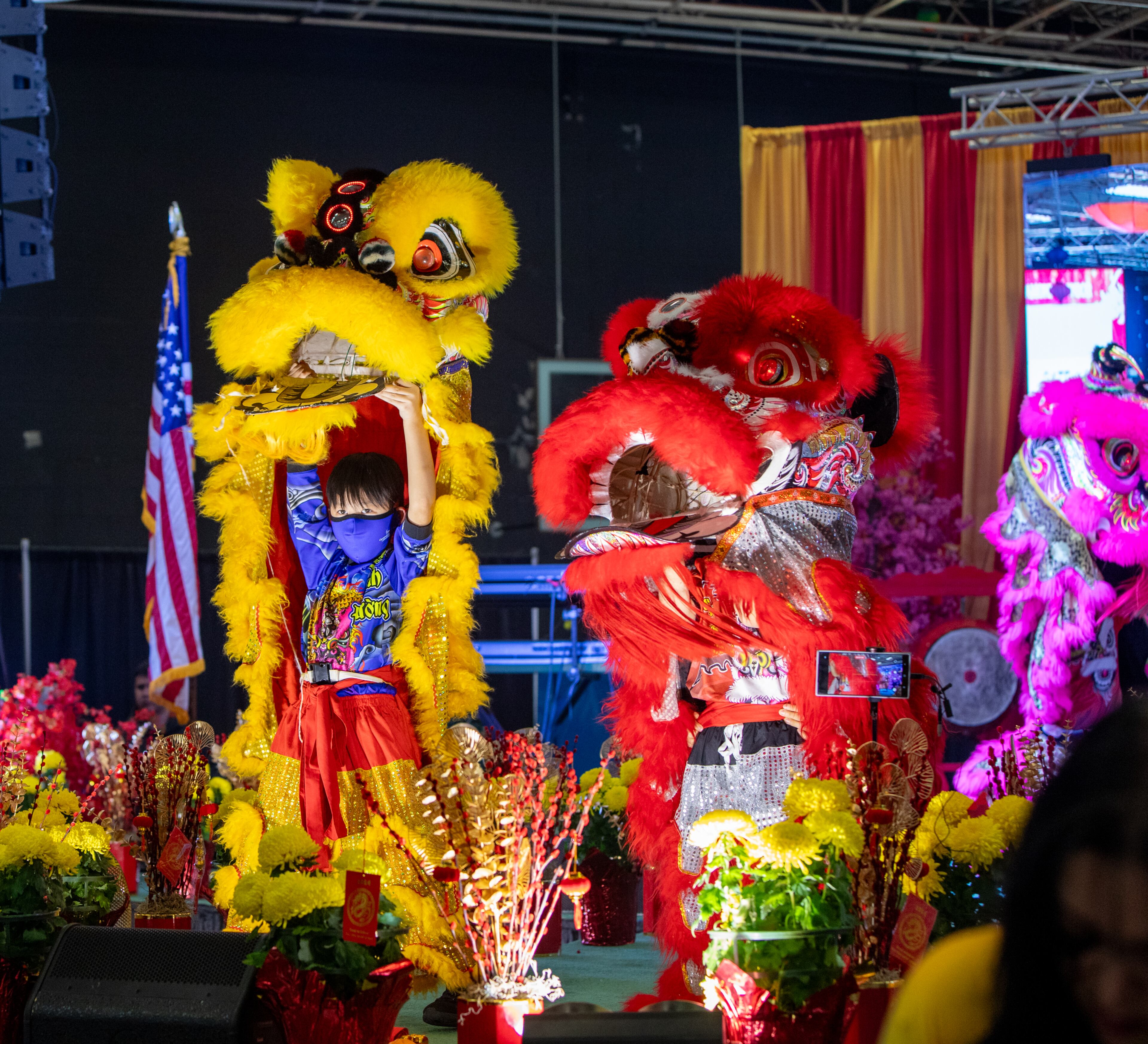 The Vietnamese American Community of Georgia hosts a Lunar New Year celebration at Plaza Las Americas in Lilburn on Saturday, Feb 3, 2024 where dragon and lion dancing begins the weekend. The celebration continues on Sunday and includes traditional food, music and cultural festivities. (Jenni Girtman for The Atlanta Journal-Constitution)