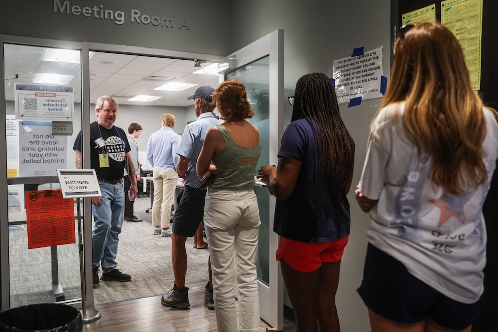 People wait in line to vote at Buckhead Library last month. (Abbey Cutrer/AJC)