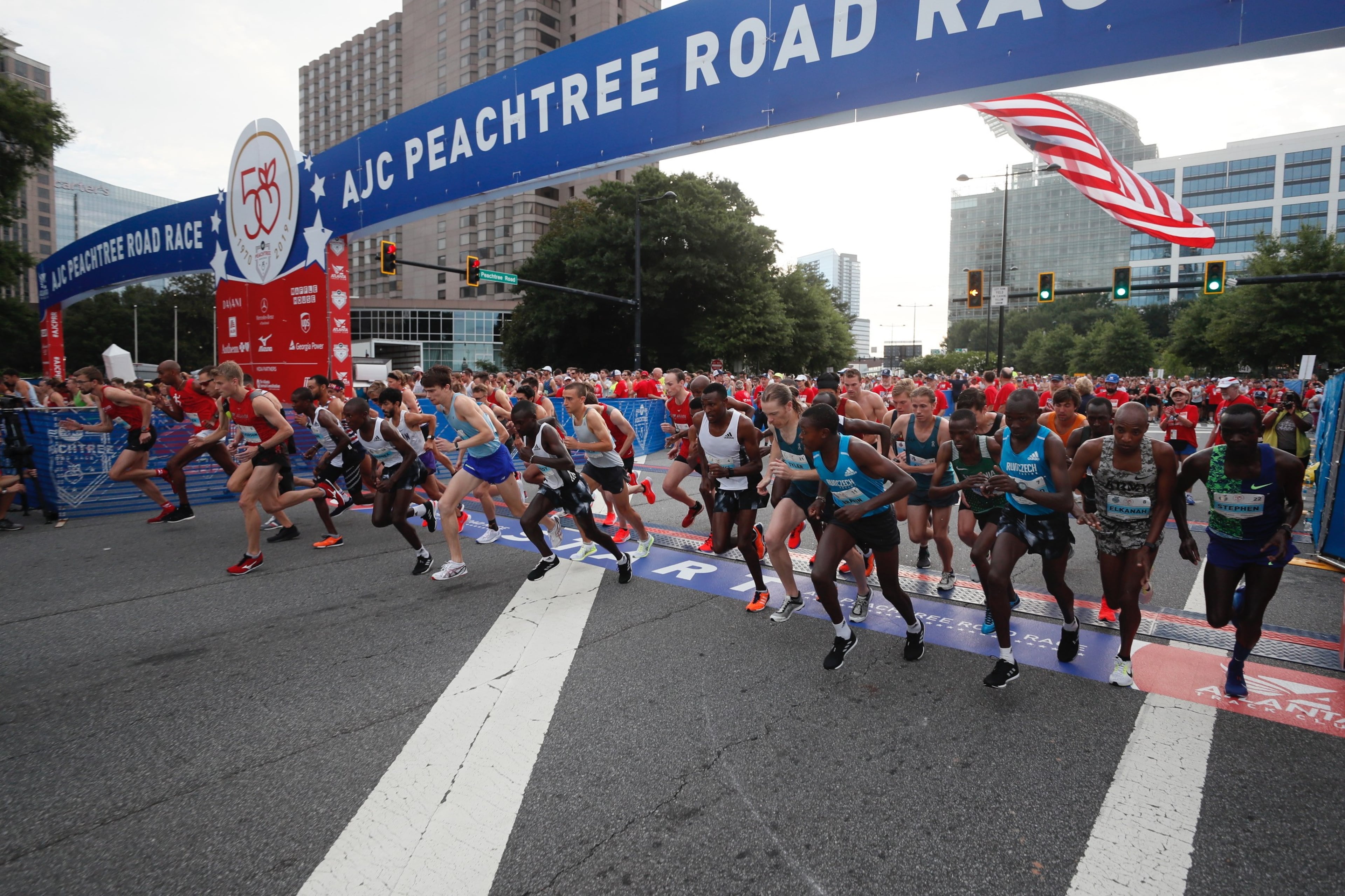 The start of the men’s elite division race during AJC Peachtree Road Race on Thursday, July 4, 2019.