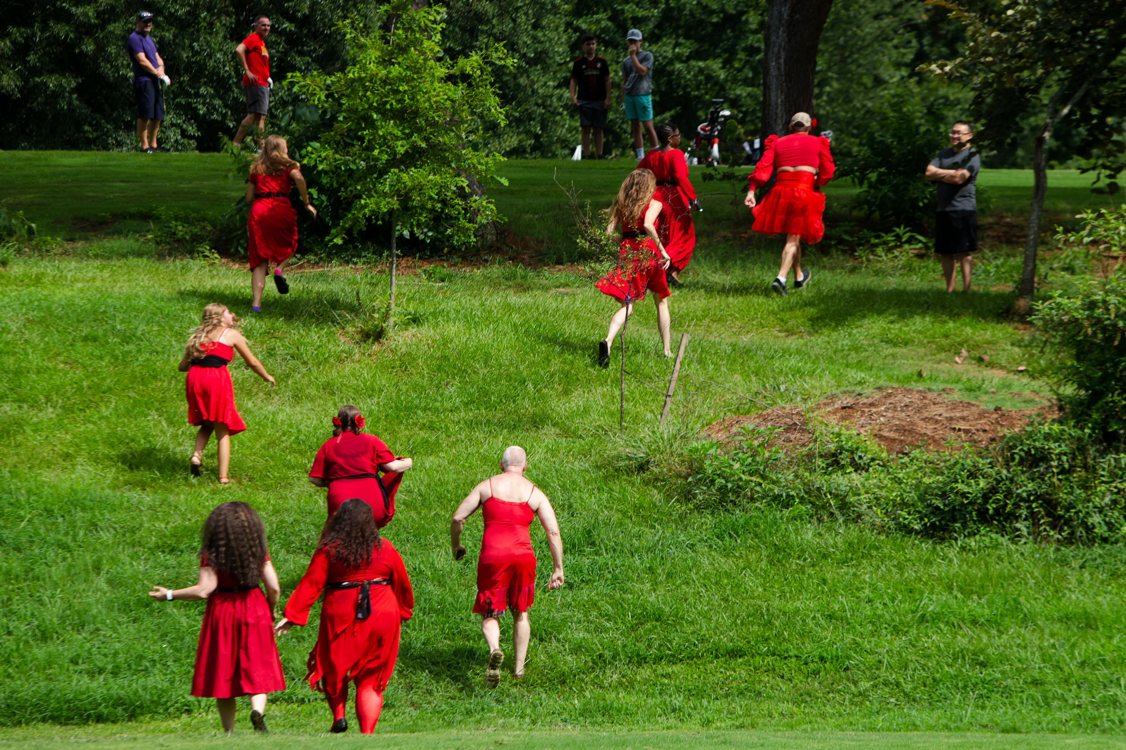 Kate Bush fans "running up that hill" after a group dance performance to celebrate the seventh annual international "Most Wuthering Heights Day Ever," on Saturday, July 30, 2022, in Candler Park in Atlanta. The event celebrates Kate Bush's 1978 song "Wuthering Heights" with events in more than 40 cities around the world. CHRISTINA MATACOTTA FOR THE ATLANTA JOURNAL-CONSTITUTION