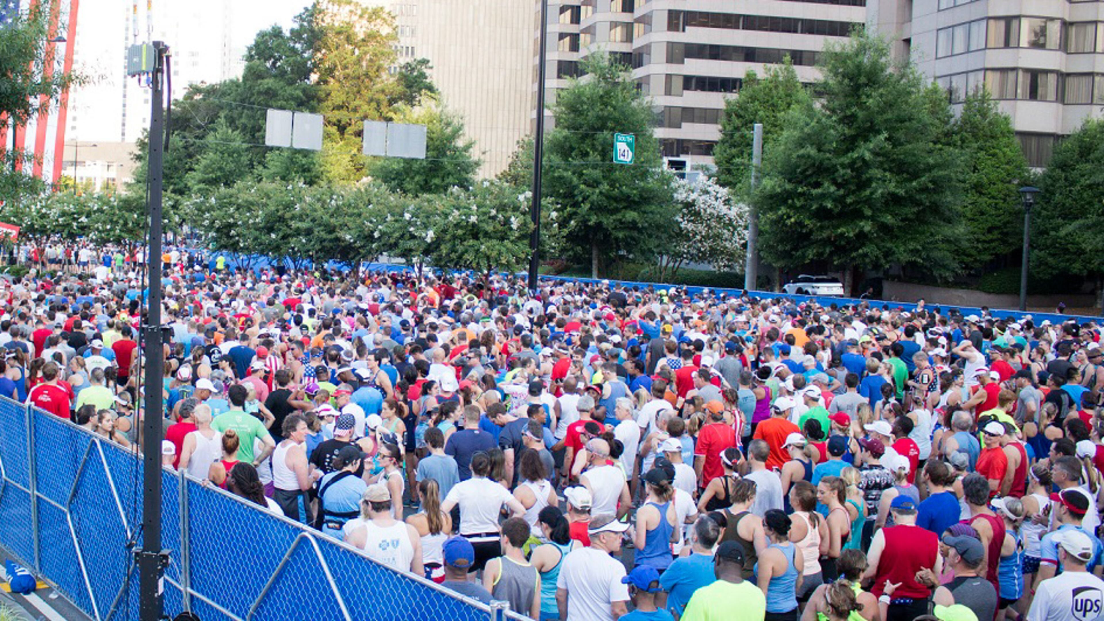 People line up to run in the annual AJC Peachtree Road Race on Wednesday, July 4, 2018. Jenna Eason / Jenna.Eason@coxinc.com