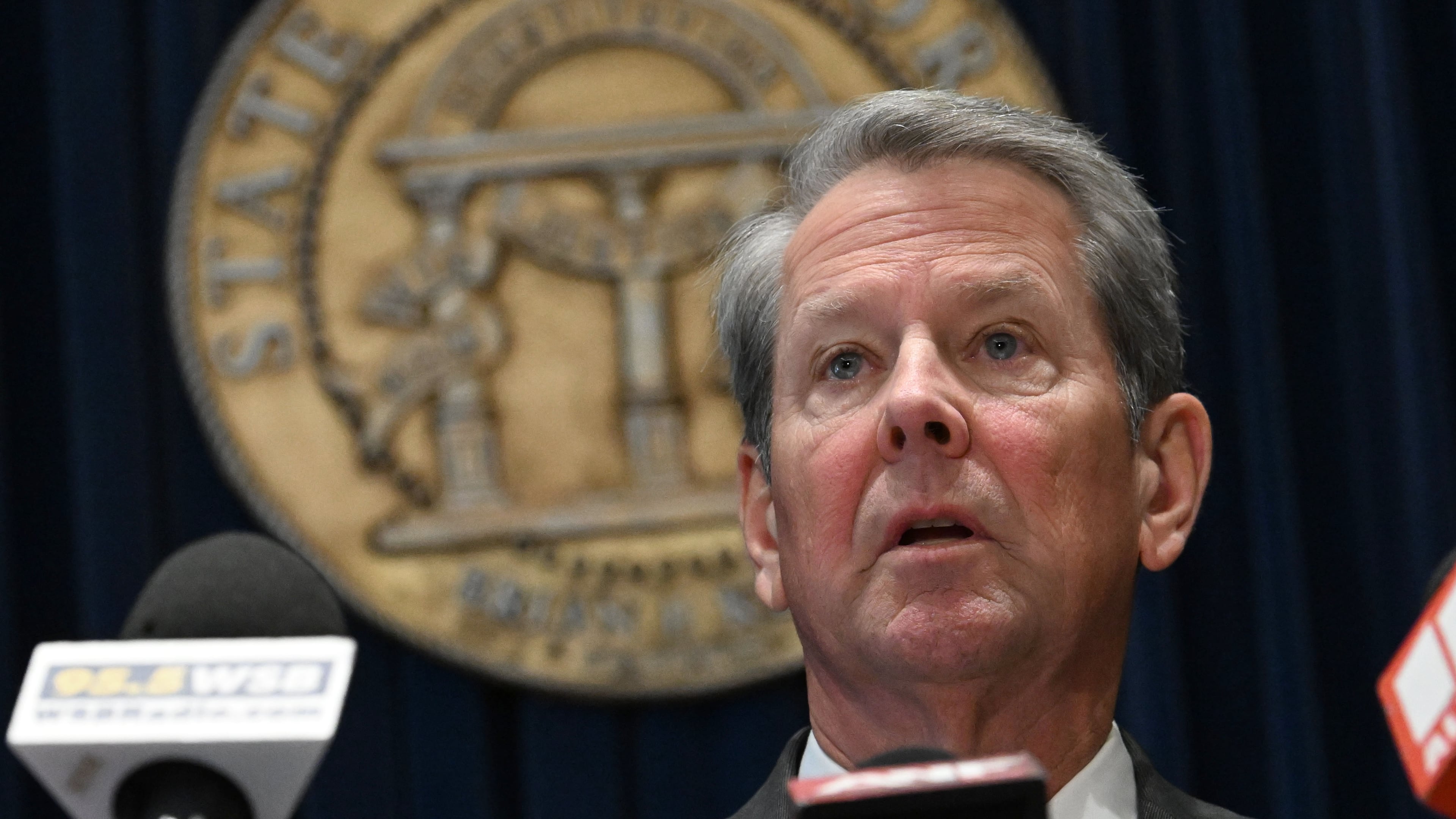 Gov. Brian Kemp speaks before signing the state’s new budget at the Georgia Capitol on Tuesday, May 12, 2026, in Atlanta. Kemp signed the budget, but not without trimming about $300 million of spending approved by the General Assembly just last month. (Hyosub Shin/AJC)
