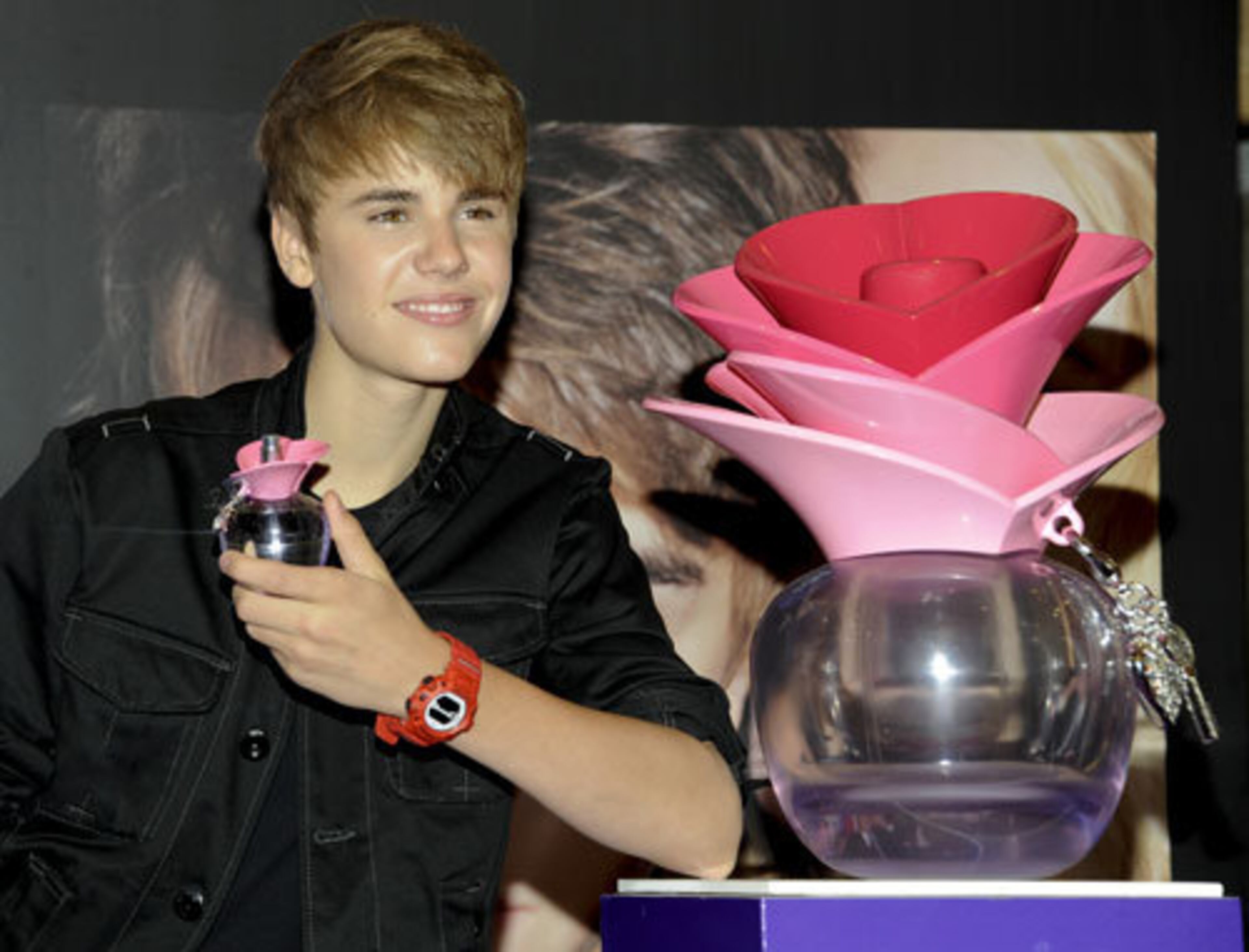 Pop singer Justin Bieber made an appearance at Macy's to launch his new fragrance Someday on Thursday, June 23, 2011 in New York. As he worked the purple stage inside, a crowd began to form outside, creating a near-riot after the launch, but we'll get to that...