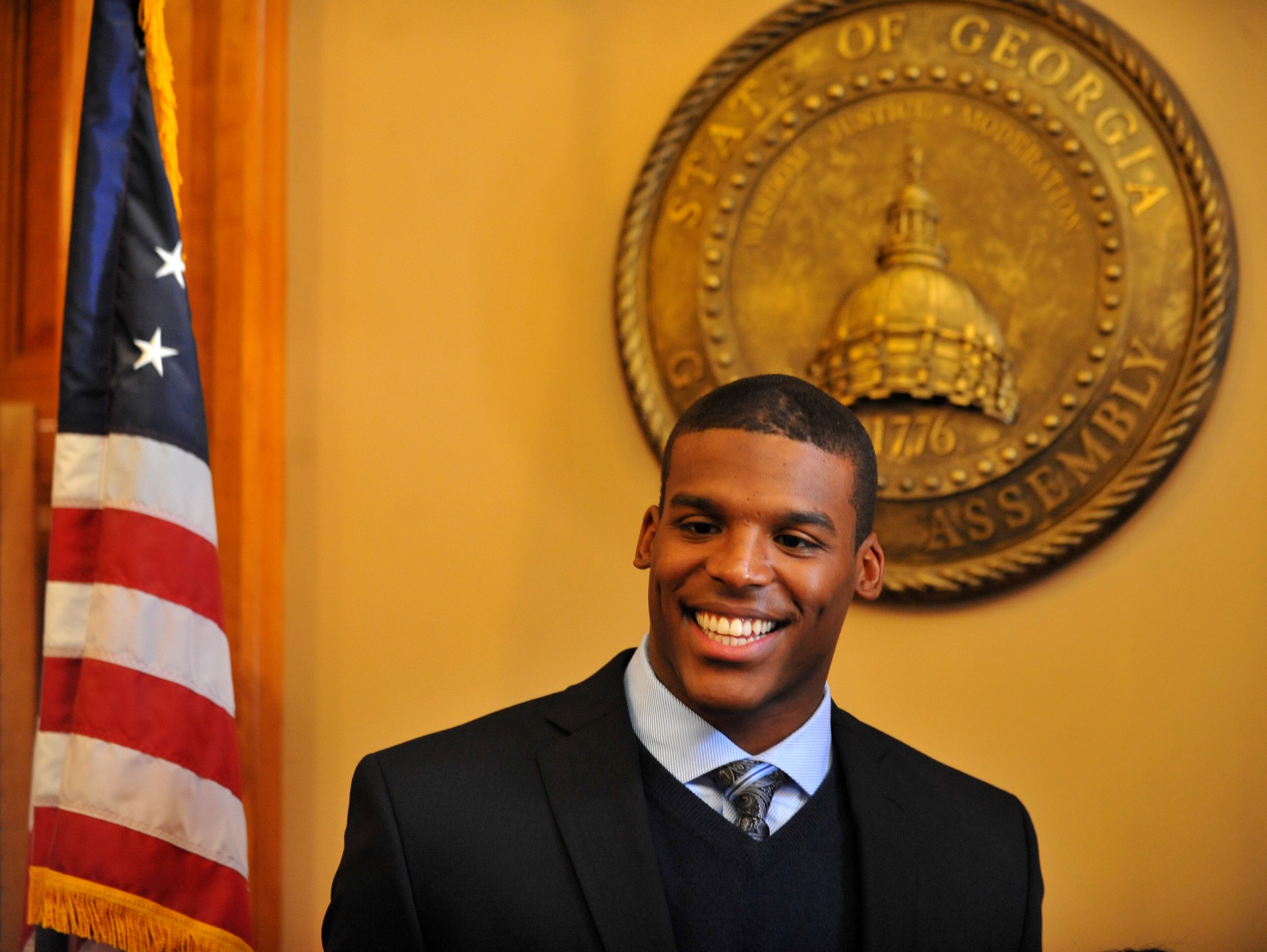 Westlake High School graduate and 2010 Heisman Trophy winner, Cam Newton was honored by members of the Georgia House and Senate Friday April 1, 2011. Brant Sanderlin bsanderlin@ajc.com