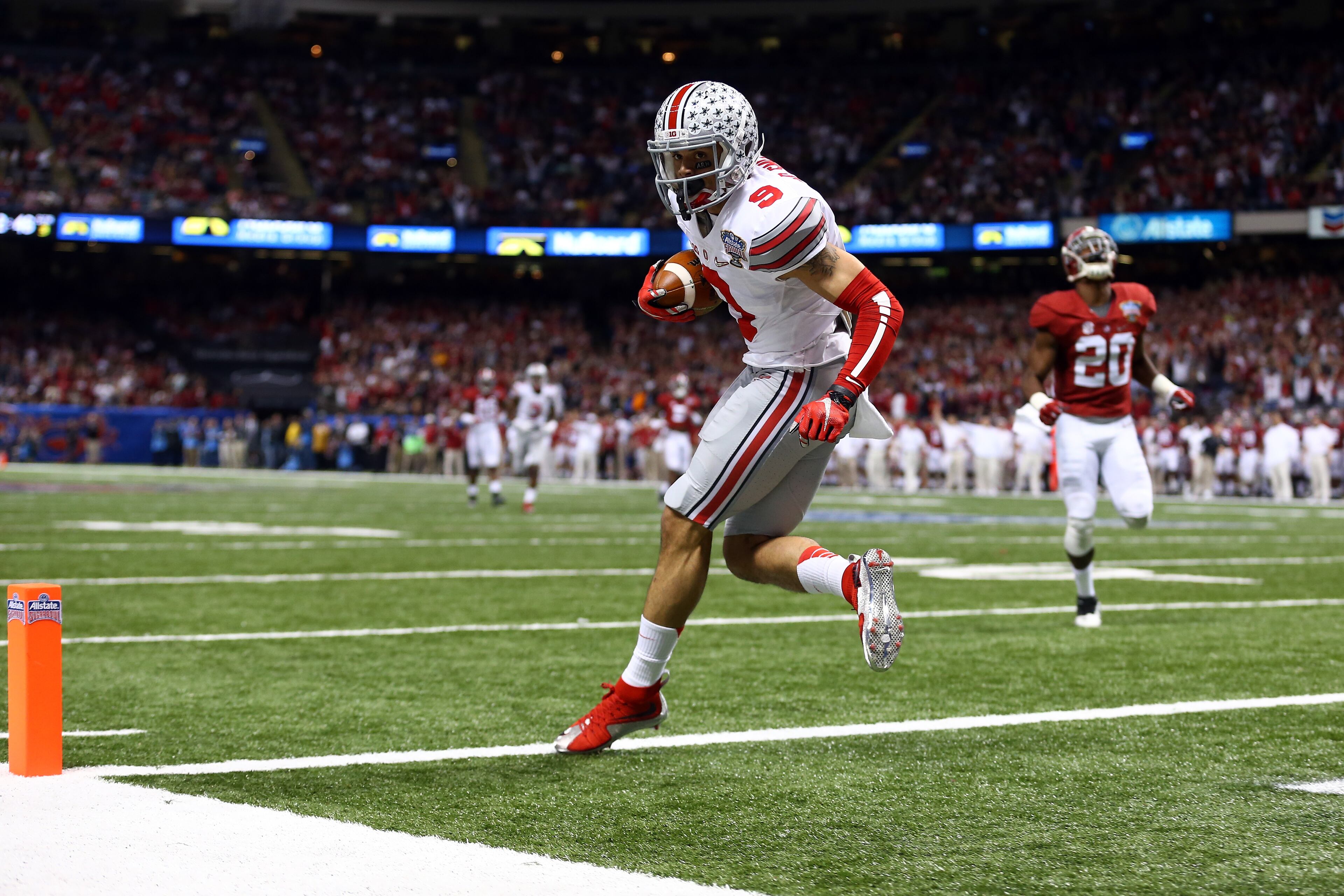 Devin Smith #9 of the Ohio State Buckeyes catches a 47 yard touchdown pass in the third quarter against the Alabama Crimson Tide during the All State Sugar Bowl at the Mercedes-Benz Superdome on January 1, 2015 in New Orleans, Louisiana. (Photo by Streeter Lecka/Getty Images) *** BESTPIX ***