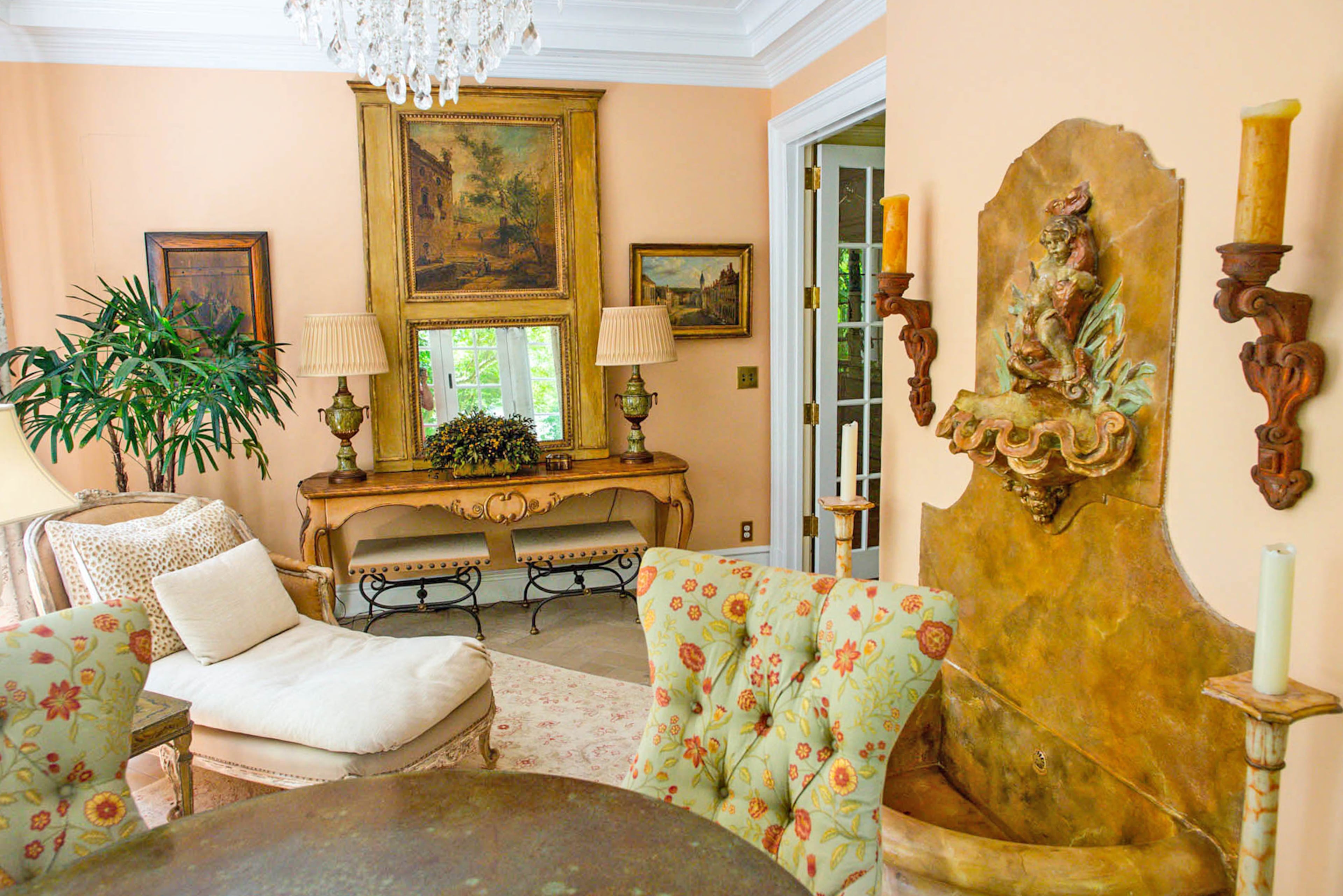 In the summer, the original indoor fountain was replumbed to convert it from a faucet spigot that ran down the drain to a recirculated pump system.