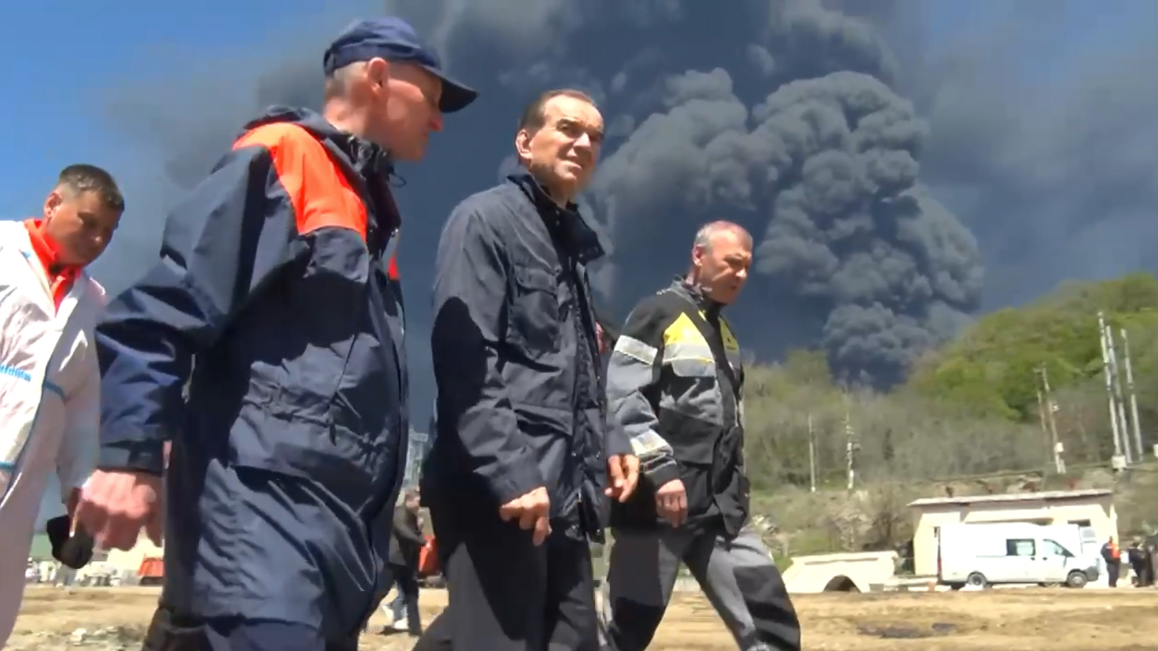 FILE - In this image taken from a video released by Gov. Veniamin Kondratyev's Telegram channel, Kondratyev, 2nd right, inspects the aftermath of a drone attack on the oil refinery and terminal in Tuapse, Russia, on Wednesday, April 29, 2026. (Gov. Veniamin Kondratyev Telegram channel via AP, File)