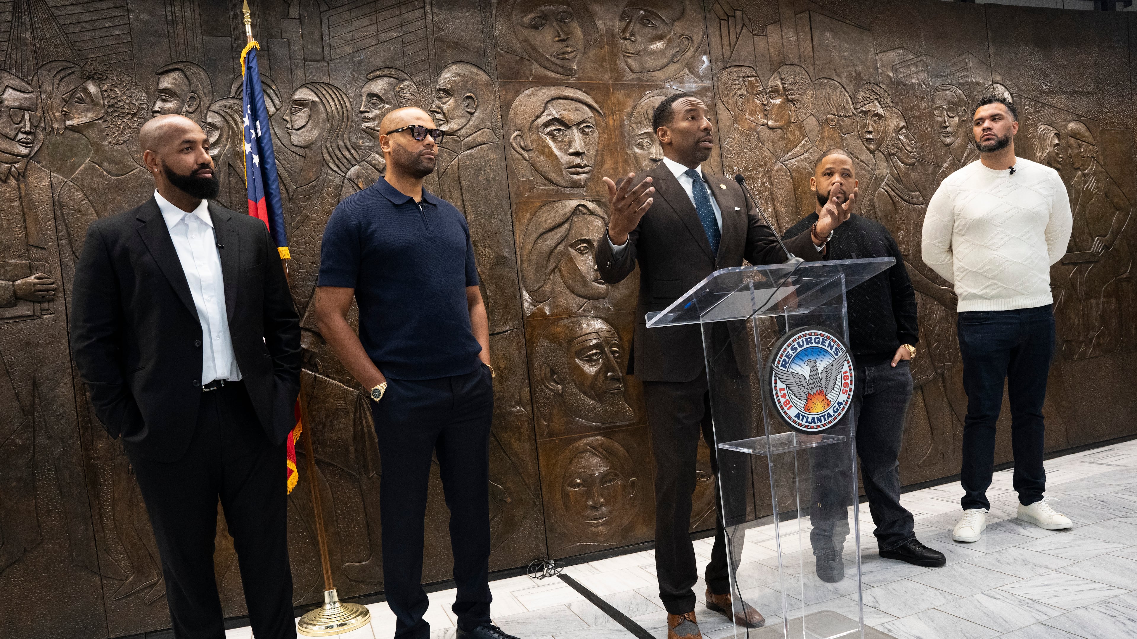 Troy Millings, Rashad Bilal, Mayor Andre Dickens, Matthew Garland, and Michael MacDonald announce the details for Atlanta's fourth annual Invest Fest at Atlanta City Hall on Friday, March 22, 2024. (Olivia Bowdoin for the AJC)