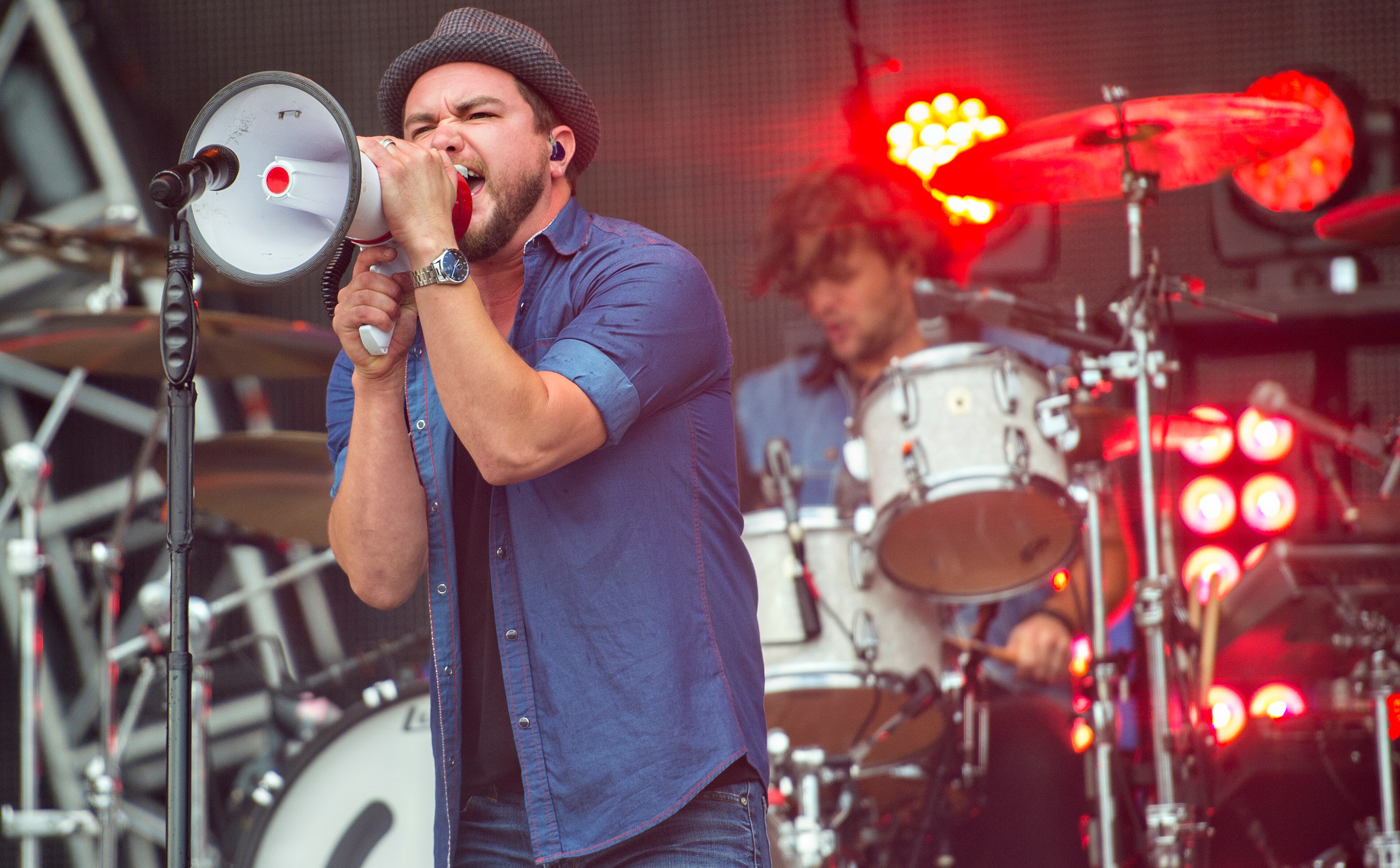 The Eli Young Band's Mike Eli uses a bullhorn as he performs during the Shaky Boots Music Festival at Kennesaw State University on Sunday, May 17, 2015. The inaugural two day festival featured country music by Cracker, Eli Young Band, Justin Moore, Old Crow Medicine Show and Brad Paisley. JONATHAN PHILLIPS / SPECIAL