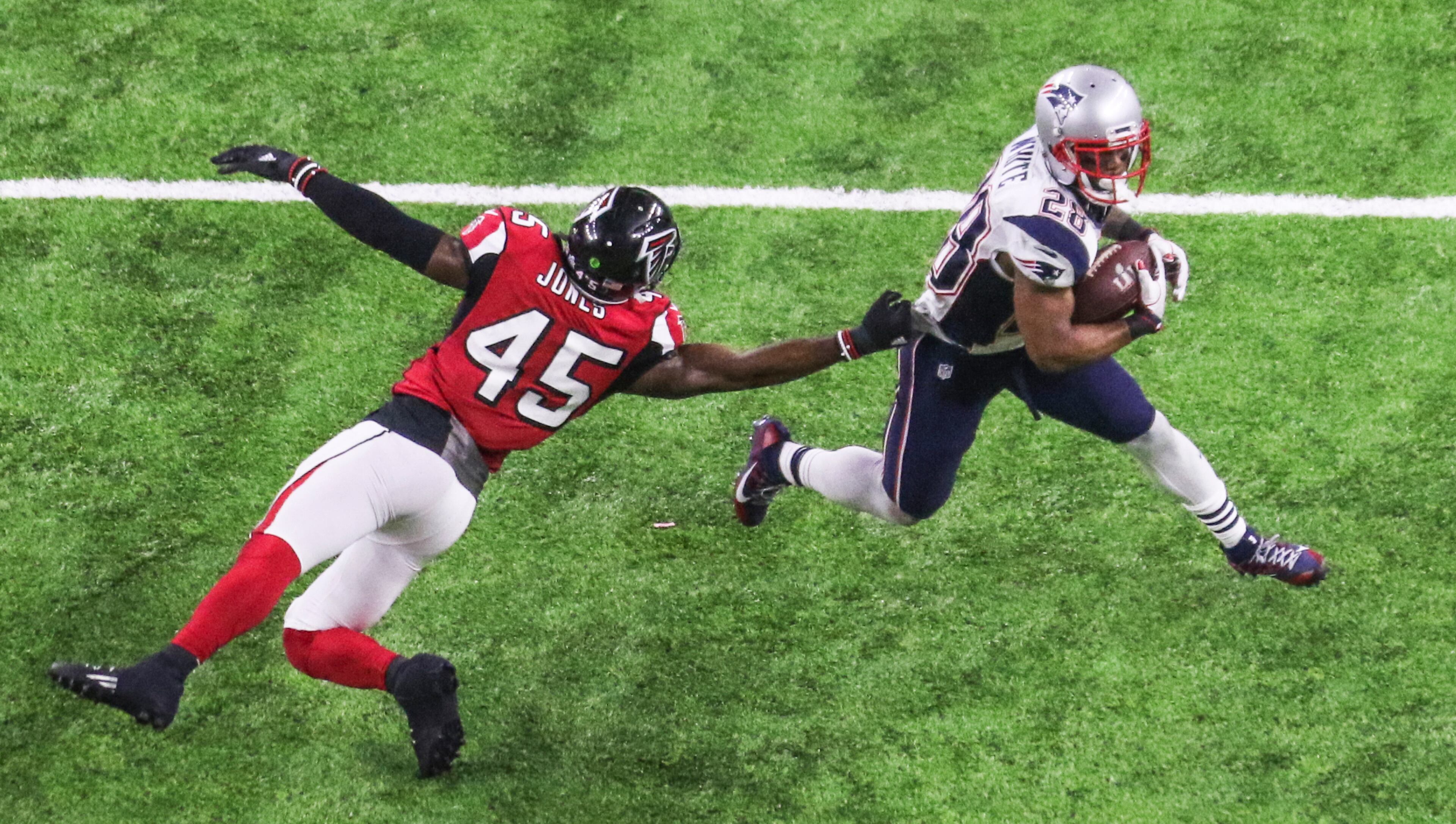 James White scored three touchdowns in the game, one each rushing and receiving before the game-winner in overtime. (John Spink/jspink@ajc.com).