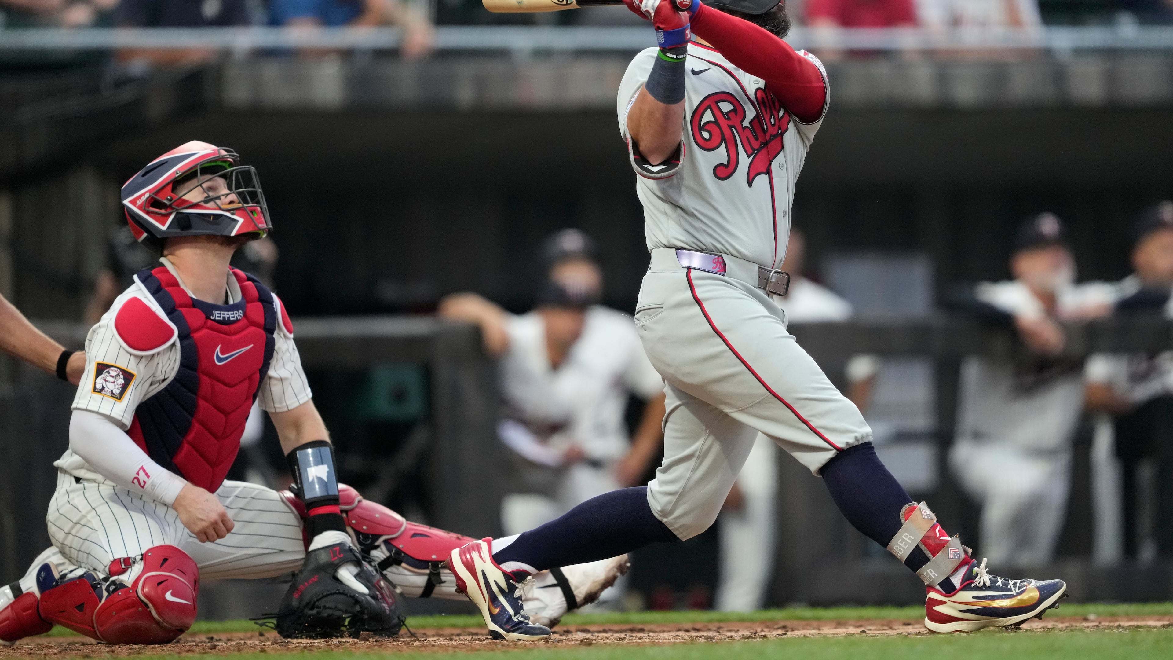 Philadelphia Phillies' Kyle Schwarber hits a home run during the fourth inning of a baseball game against the Minnesota Twins at the Field of Dreams movie site, Thursday, Aug. 13, 2026, in Dyersville, Iowa. (AP Photo/Charlie Neibergall)