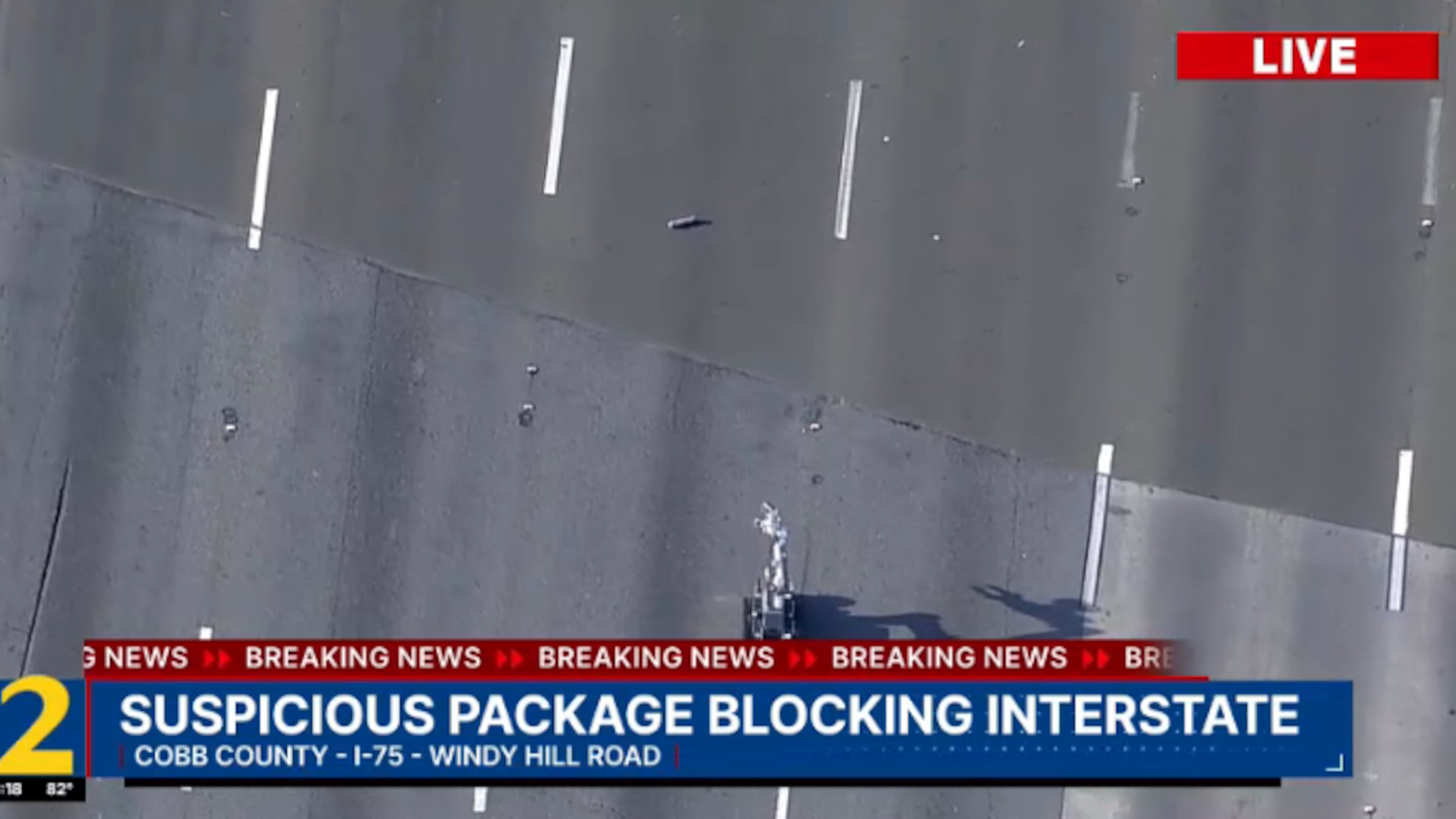 A portion of I-75 in Cobb County was closed Friday afternoon while a robotic device checked on a "suspicious item." (Courtesy of Channel 2 Action News)