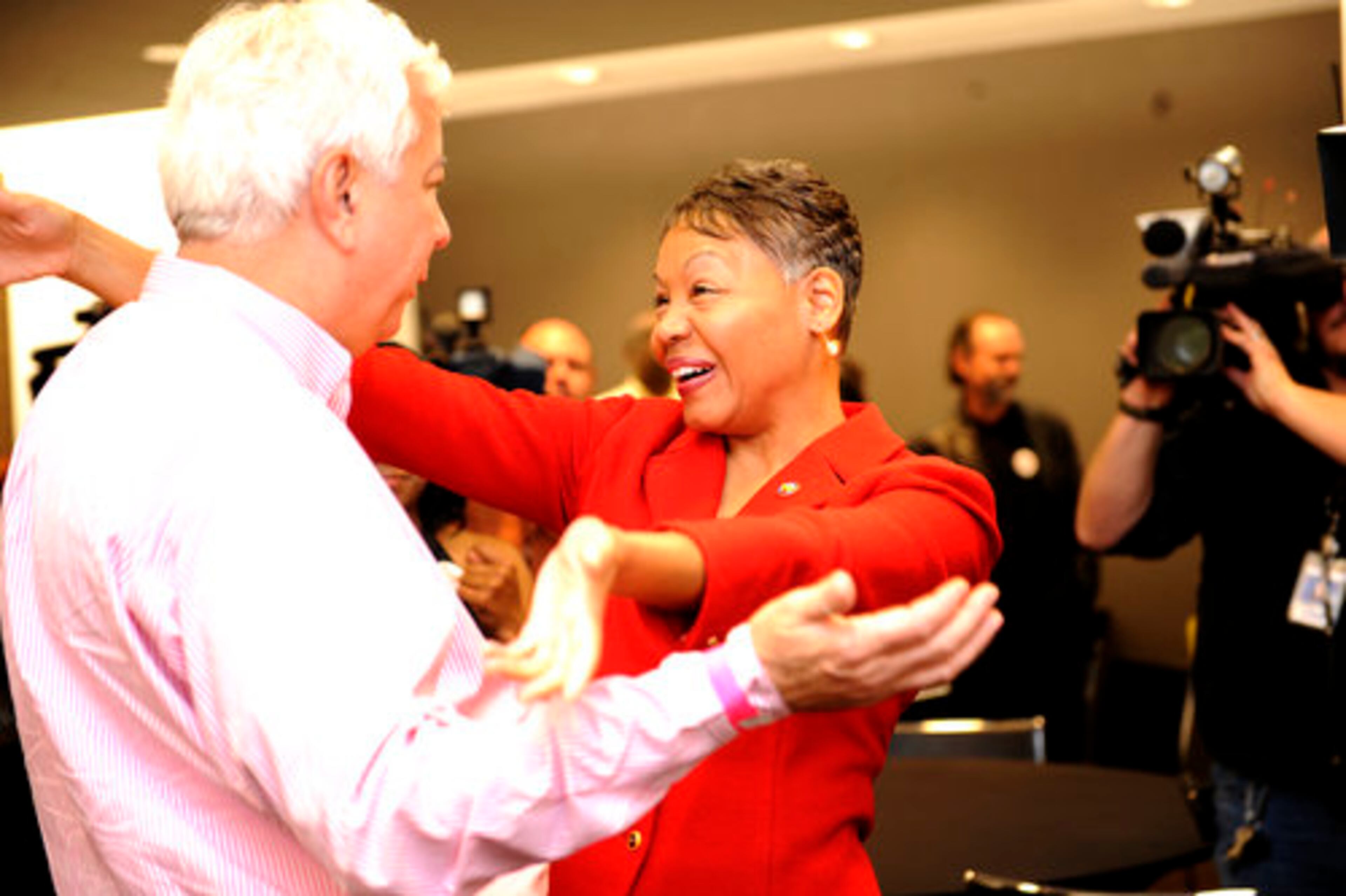 Lisa Borders greets donors in the media room.