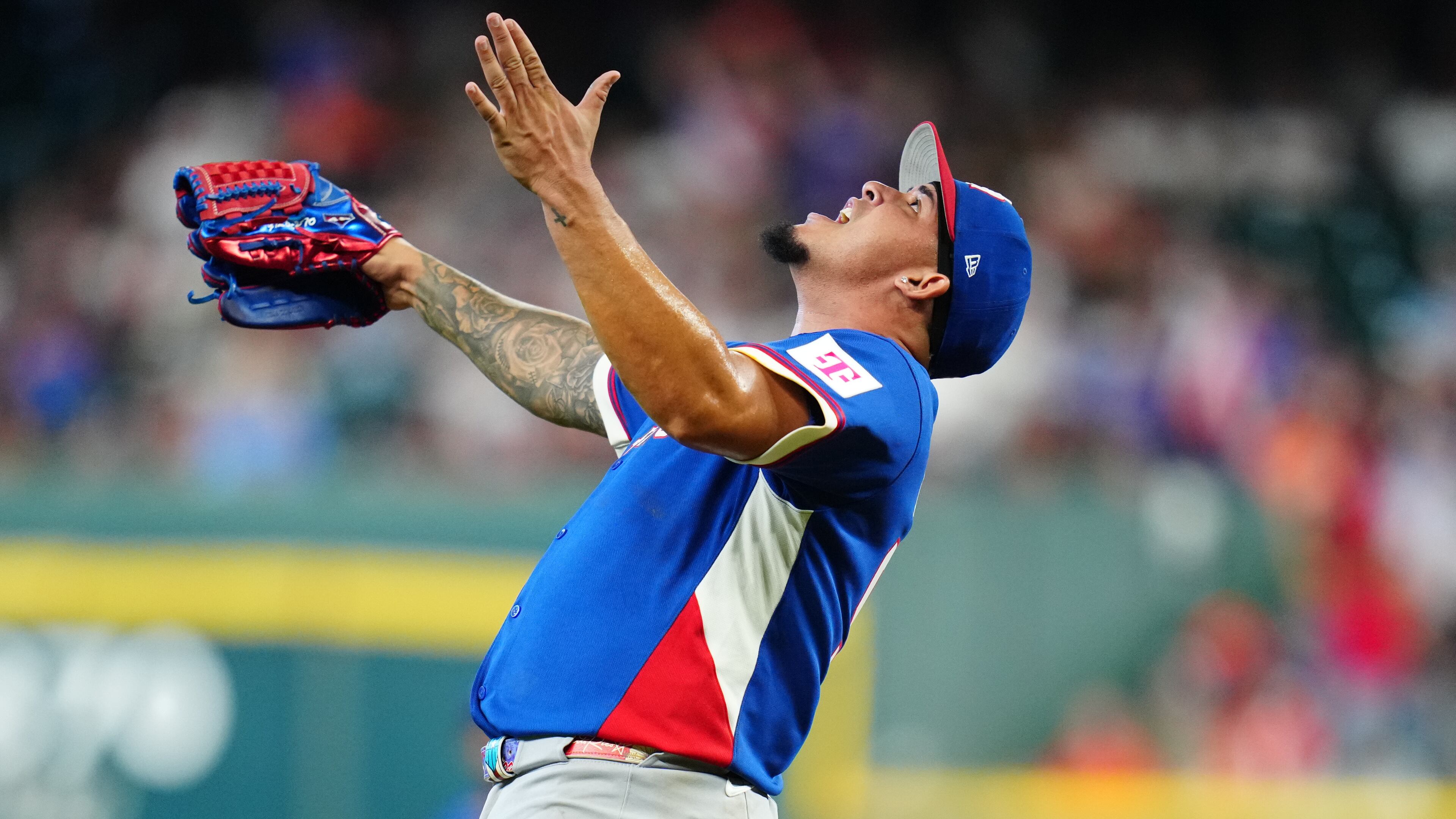 Puerto Rico pitcher Eduardo Rivera celebrates after striking out Italy's Vinnie Pasquantino during the second inning of a World Baseball Classic quarterfinal game, Saturday, March 14, 2026, in Houston. (AP Photo/Karen Warren)