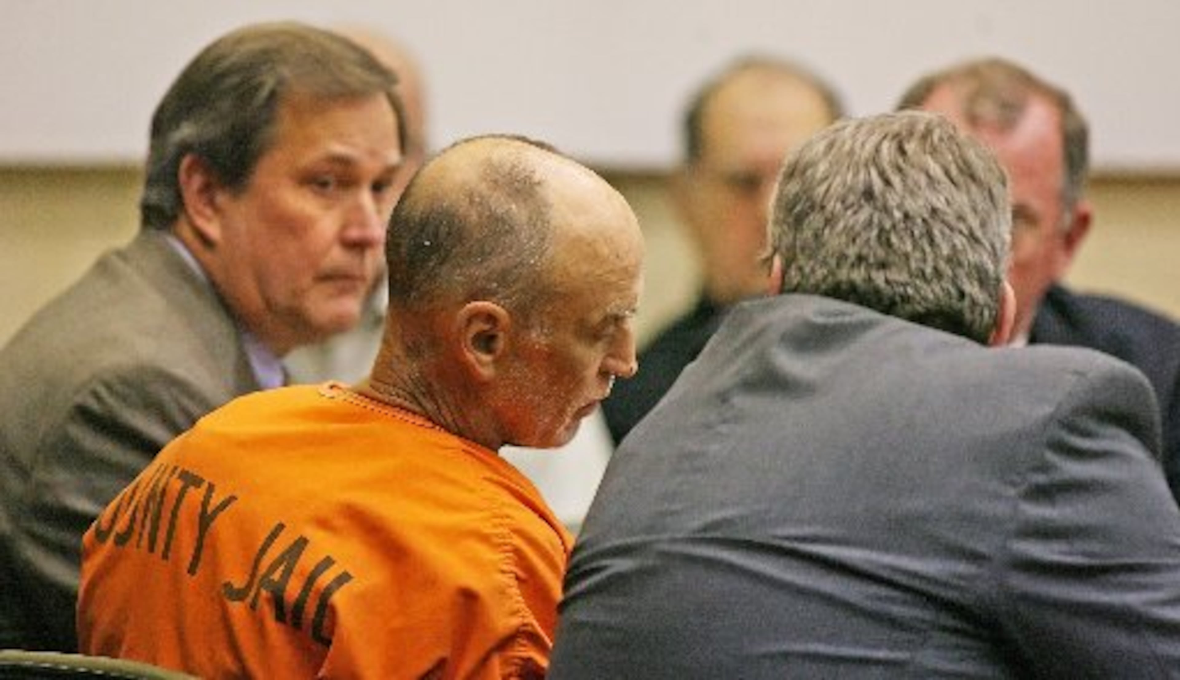 Gary Michael Hilton, flanked by public defender Rob McNeill (left), was charged with killing Meredith Emerson on Jan. 9, 2008