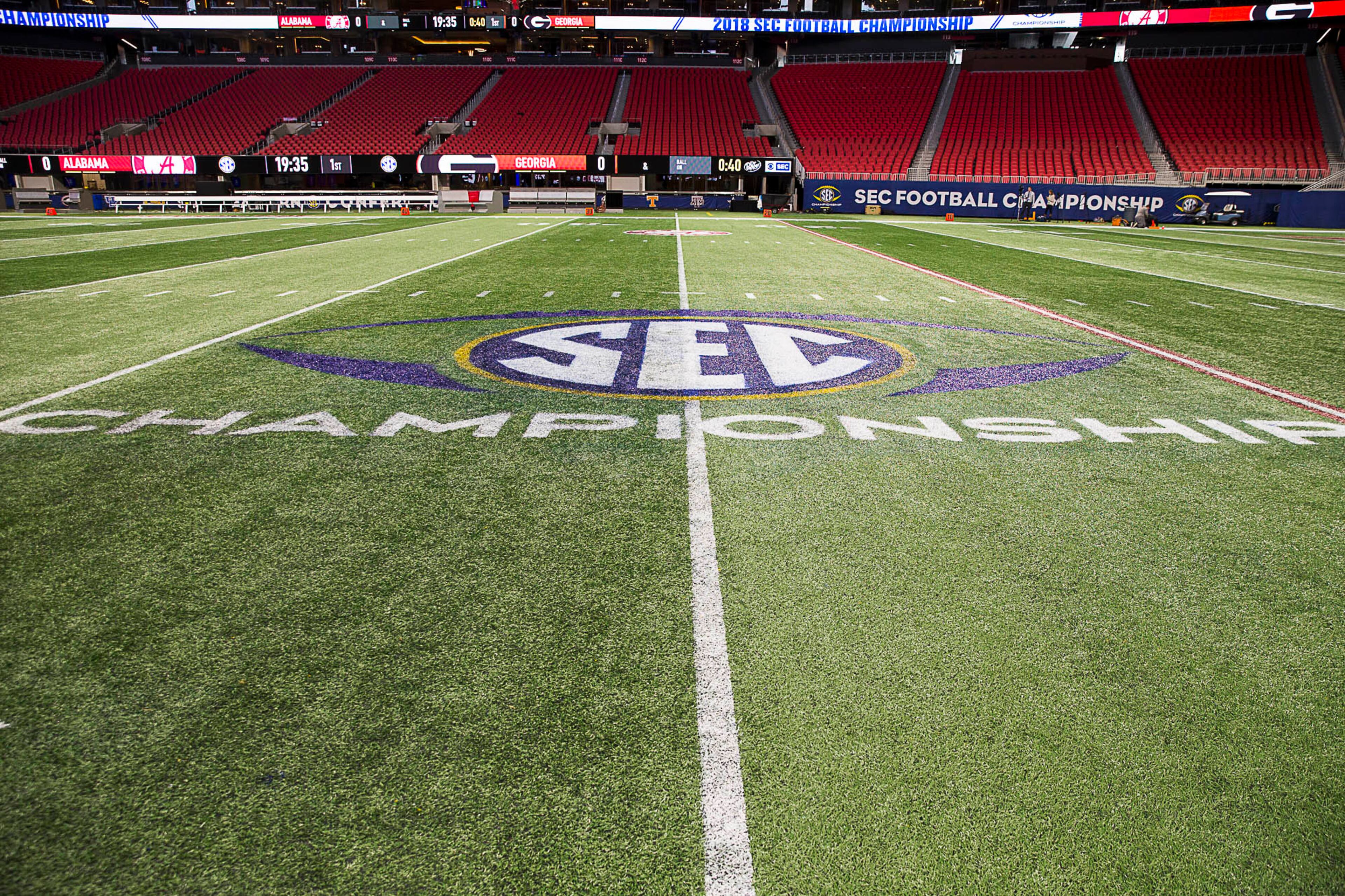 11/30/2018 -- Atlanta, Georgia -- The SEC championship logo is displayed on the field of Mercedes Benz Stadium, Friday, November 30, 2018. Georgia will play the Alabama in the 2018 SEC Championship game on Saturday (ALYSSA POINTER/ALYSSA.POINTER@AJC.COM)
