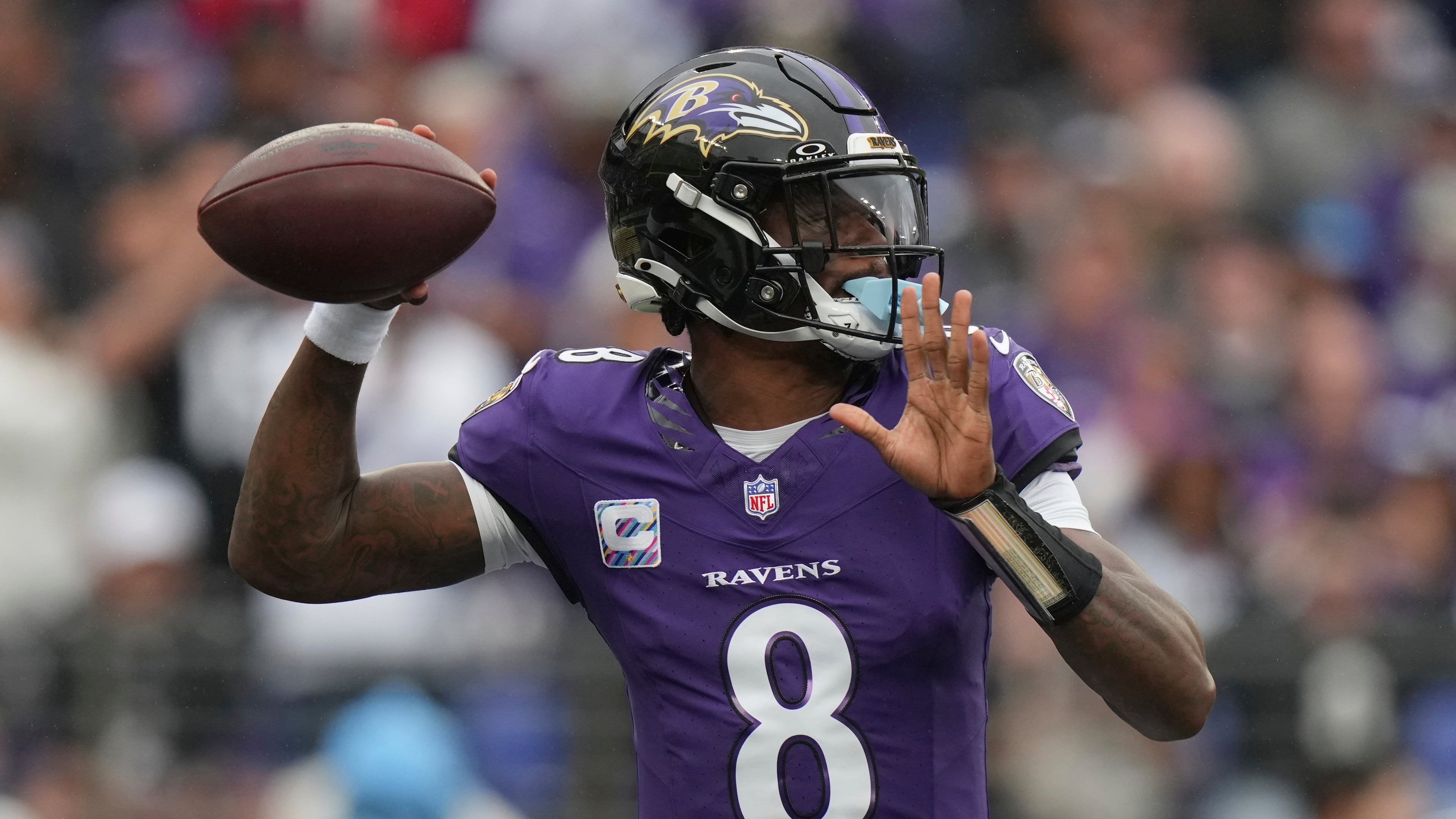 Baltimore Ravens quarterback Lamar Jackson looks to throw a pass during the first half of an NFL football game in Baltimore, Sunday, Oct. 4, 2026. (Stephanie Scarbrough/AP)