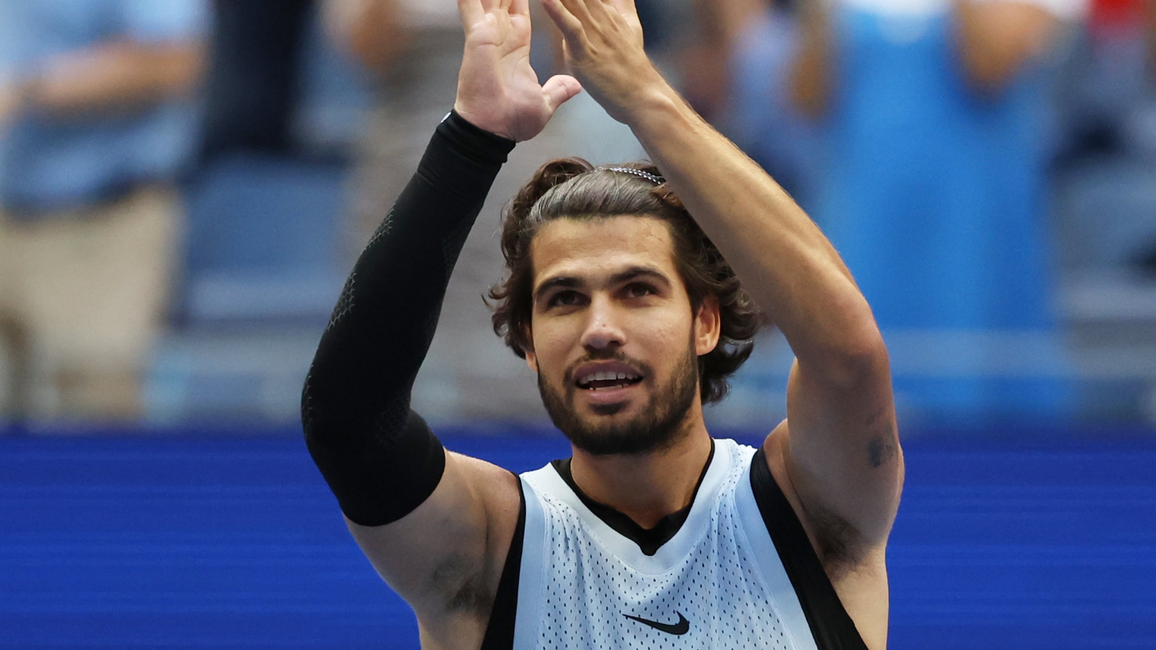 Carlos Alcaraz, of Spain, gestures after he won his match against Tommy Paul, of the United States, during the fourth round of the U.S. Open tennis championships Sunday, Sept. 6, 2026, in New York. (AP Photo/Heather Khalifa)
