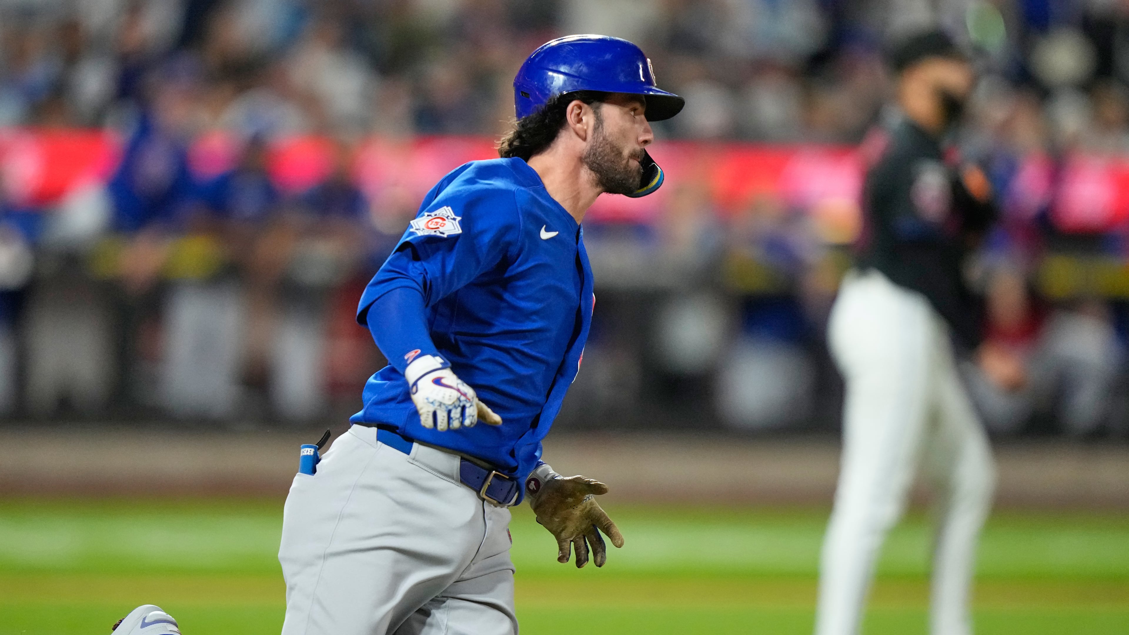Chicago Cubs' Dansby Swanson runs to first base for a two-run single during the ninth inning in the second baseball game of a doubleheader against the Chicago Cubs Wednesday, June 24, 2026, in New York. (AP Photo/Frank Franklin II)