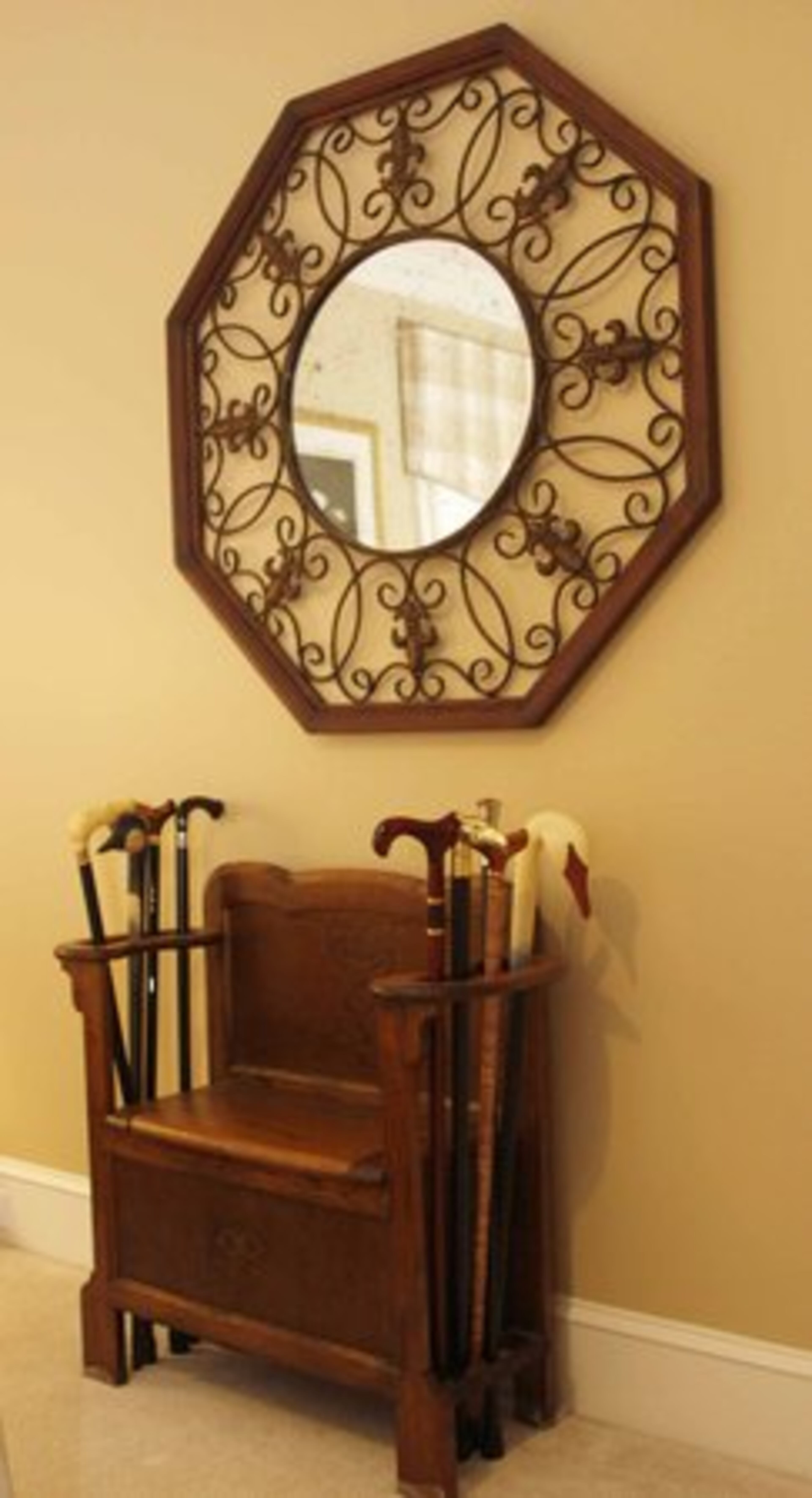 "I think collections should come to an end at some point. I did collect snow globes and canes," offers Lisa. Some of her cane collection is displayed in a guest suite.