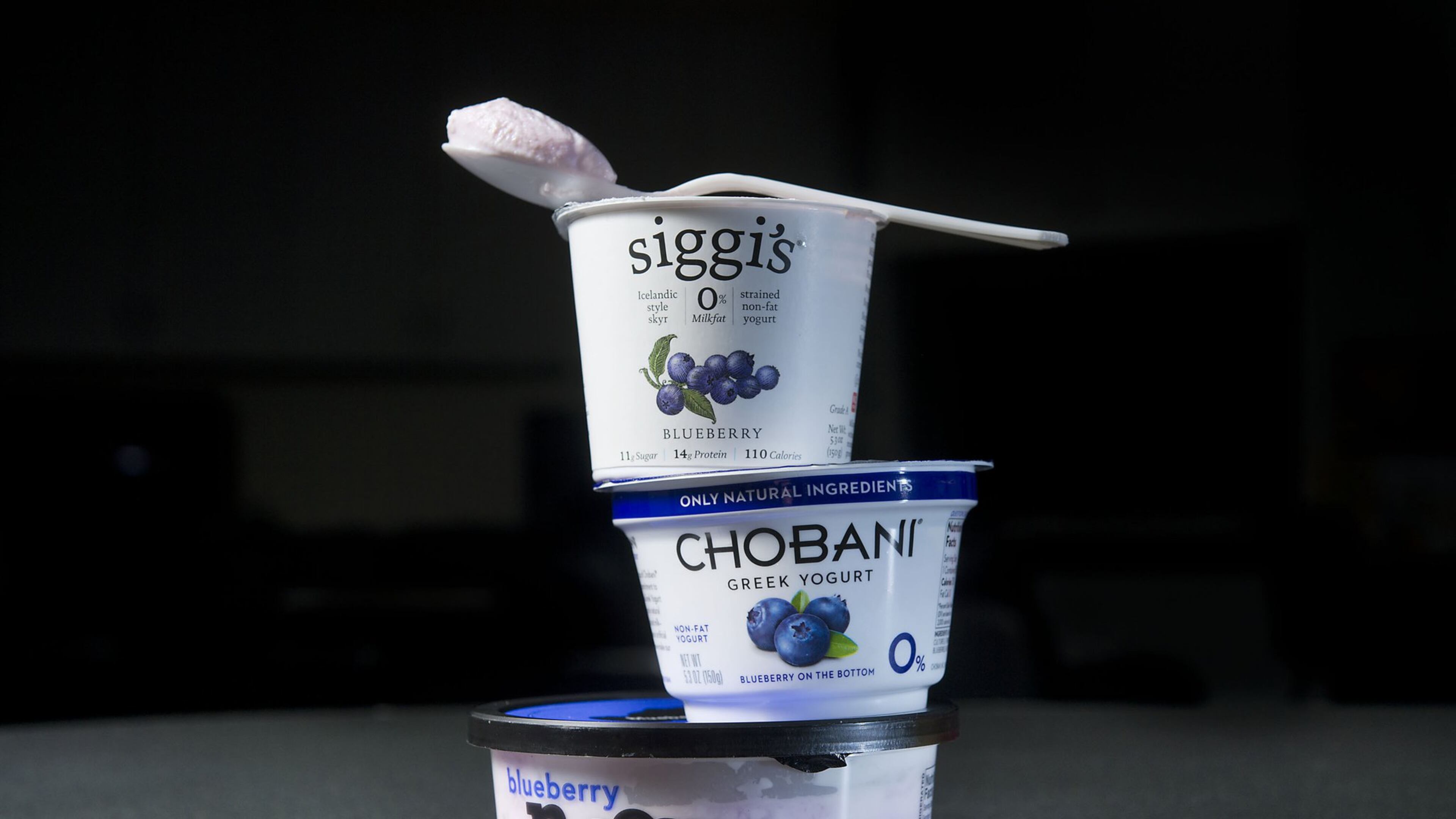 Three different yogurt products in studio in Sacramento on Thursday, Feb. 12, 2015. A recent study suggests yogurt could help lower risk of cardiovascular disease in adults who have high blood pressure. (Randall Benton/Sacramento Bee/TNS)