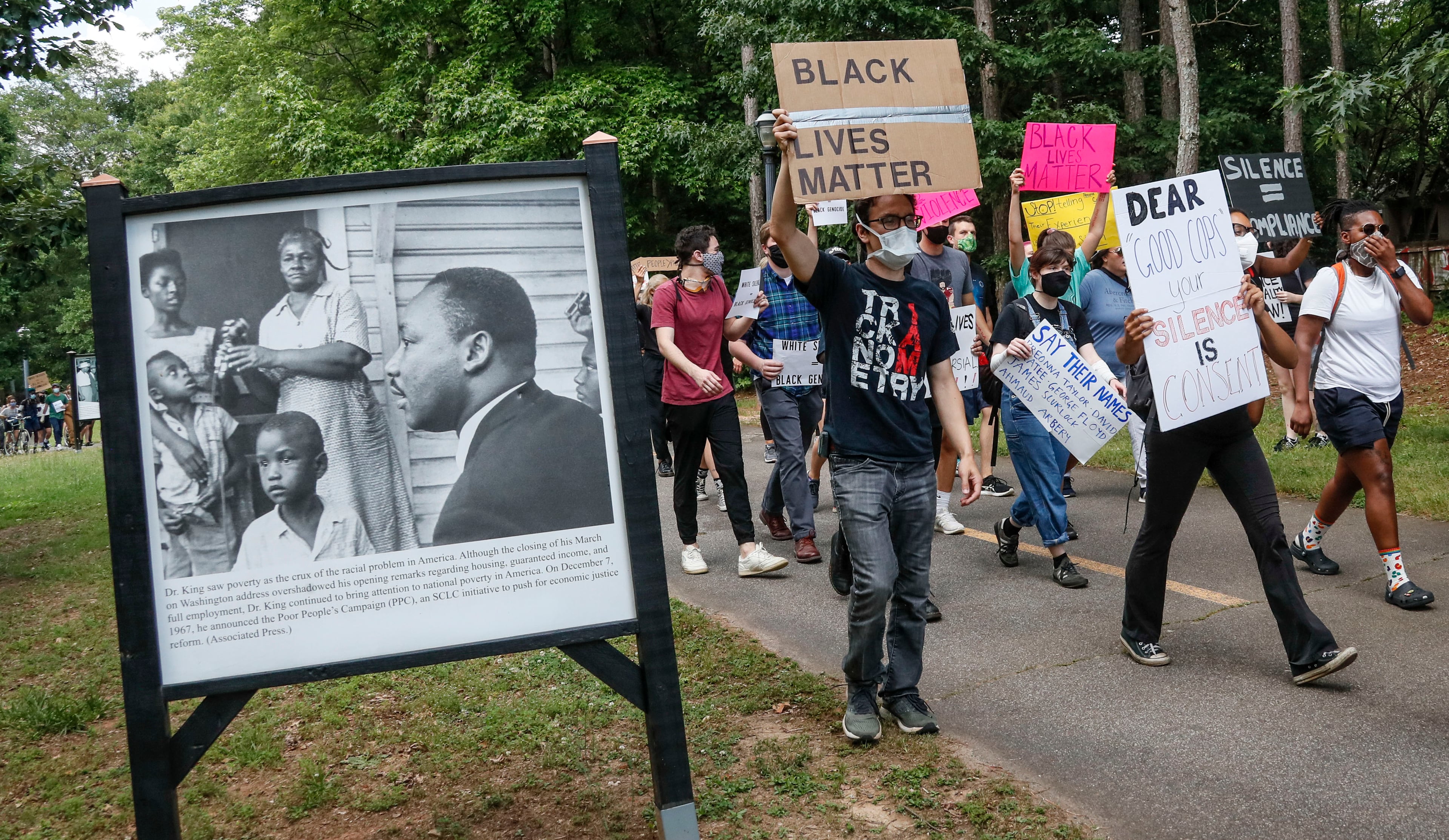 6/2/20 - Atlanta - Car horns blared in support as several hundred protestors gathered at Freedom Park in Atlanta, and marched down Freedom Trail to the BeltLine. Bob Andres / bandres@ajc.com