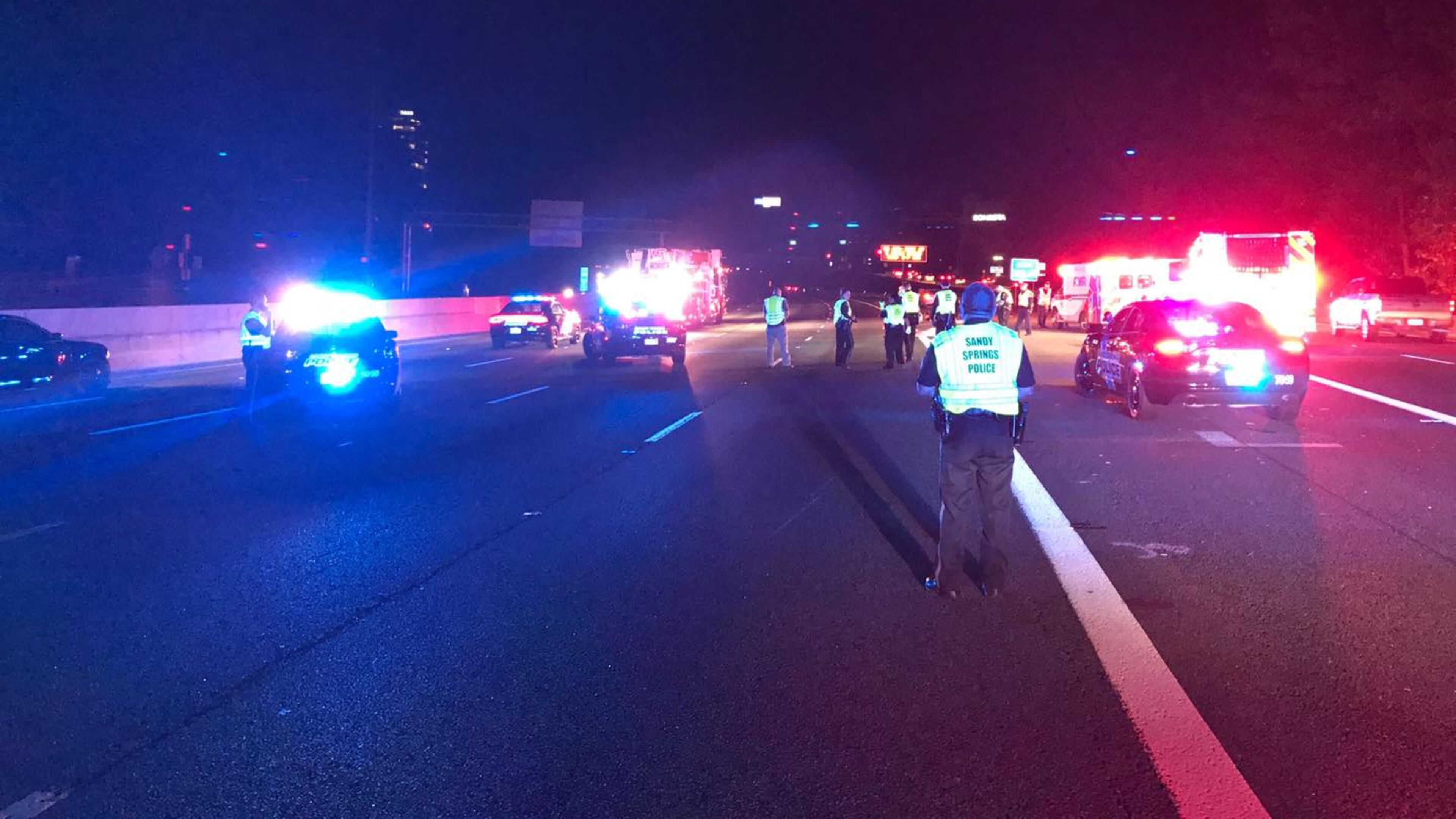 Police said the woman was illegally riding her moped on I-285 when she was struck and killed.