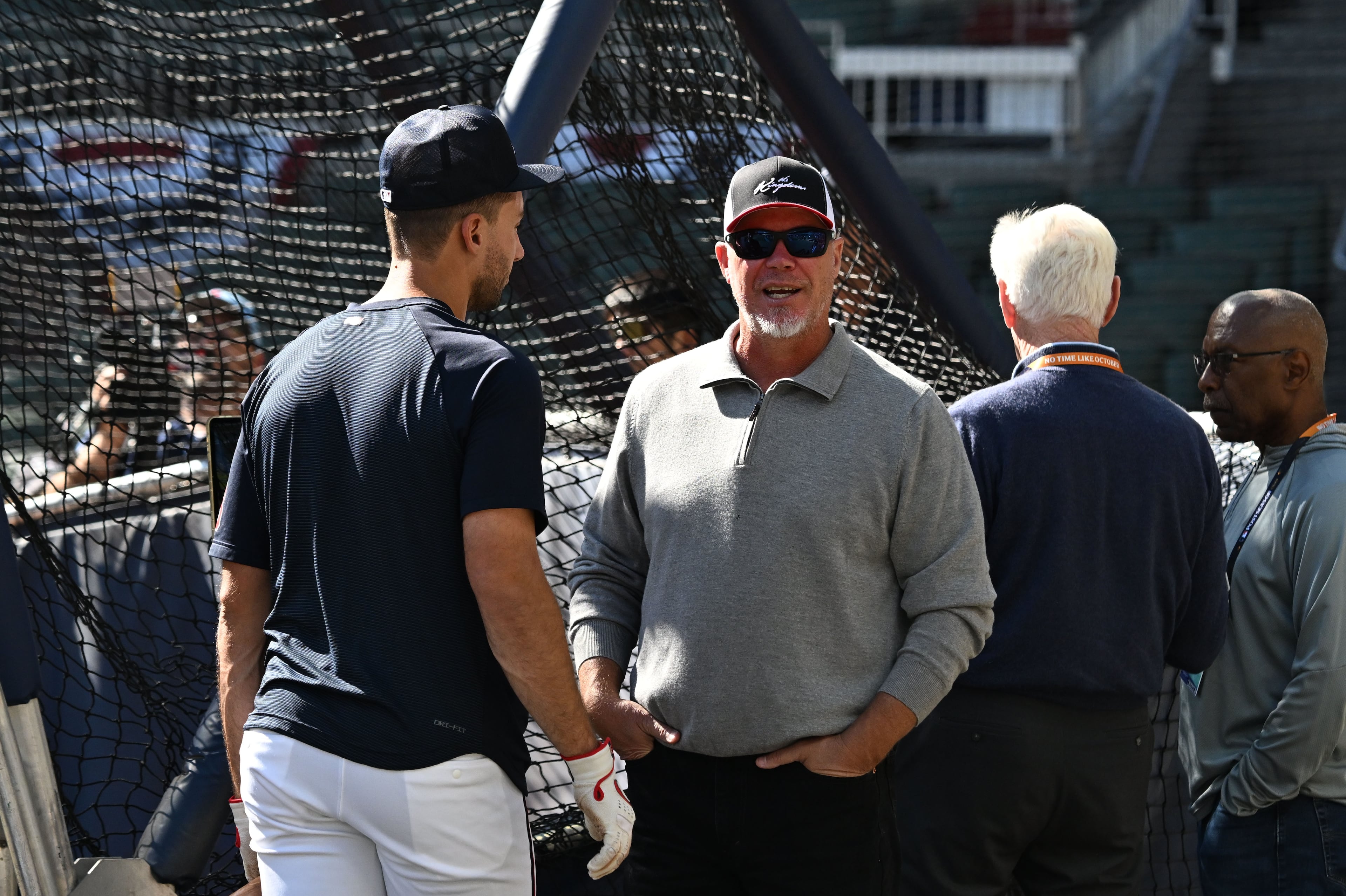 Former Braves star Chipper Jones, chats with Atlanta Braves first baseman Matt Olson, left, before Game 3 of the National League Division Series against Los Angeles Dodgers at Truist Park on Tuesday, Oct. 6, 2026, in Atlanta. (Hyosub Shin/AJC)