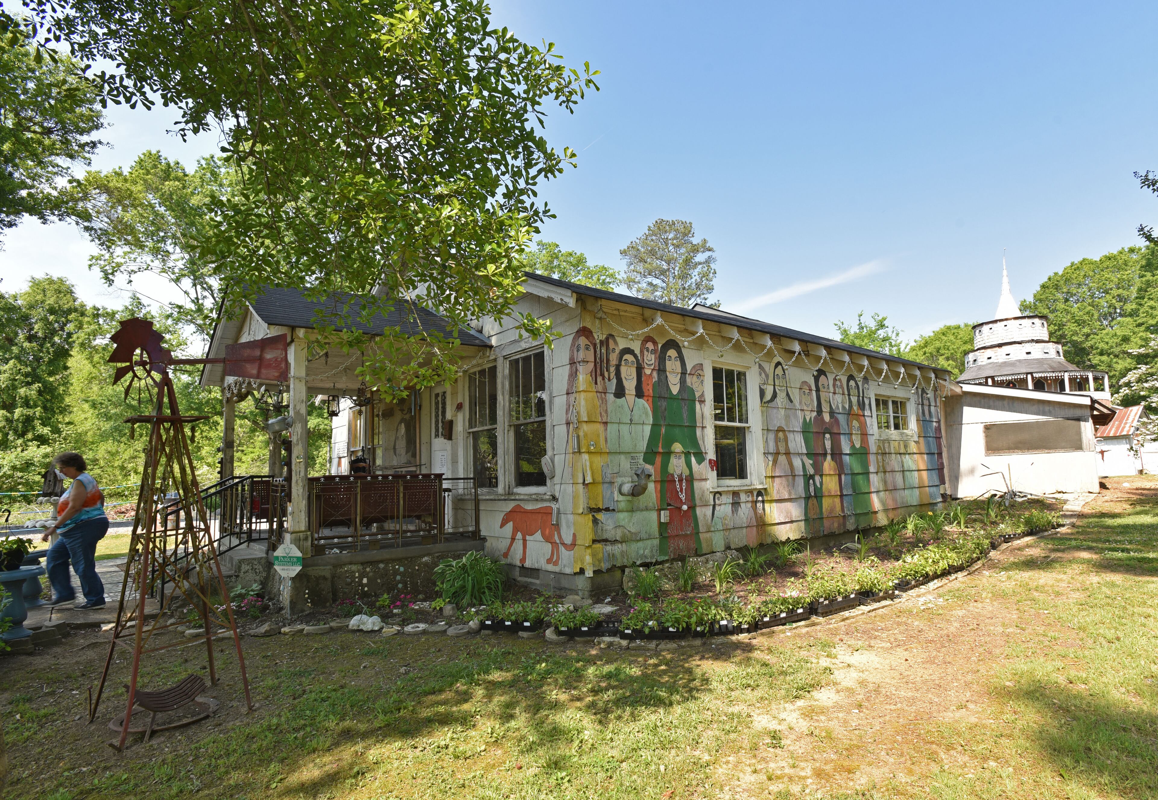 May 9, 2015 Summerville - Picture shows folk artist Howard Finster's Paradise Garden in Summerville on Saturday, May 9, 2015. Famous folk artist Howard Finster began creating Paradise Gardens in 1961. It is listed as one of Georgia's noted art attractions. Finster's outsider art -- sculpture and paintings -- draws tourists from around the world. In advance of Finster Fest, May 30-31 in the northwest Georgia town of Summerville. Georgia's most famed folk artist, Finster was known as a great American eccentric, and plenty of eccentric places survive him in this gritty corner of the state. HYOSUB SHIN / HSHIN@AJC.COM