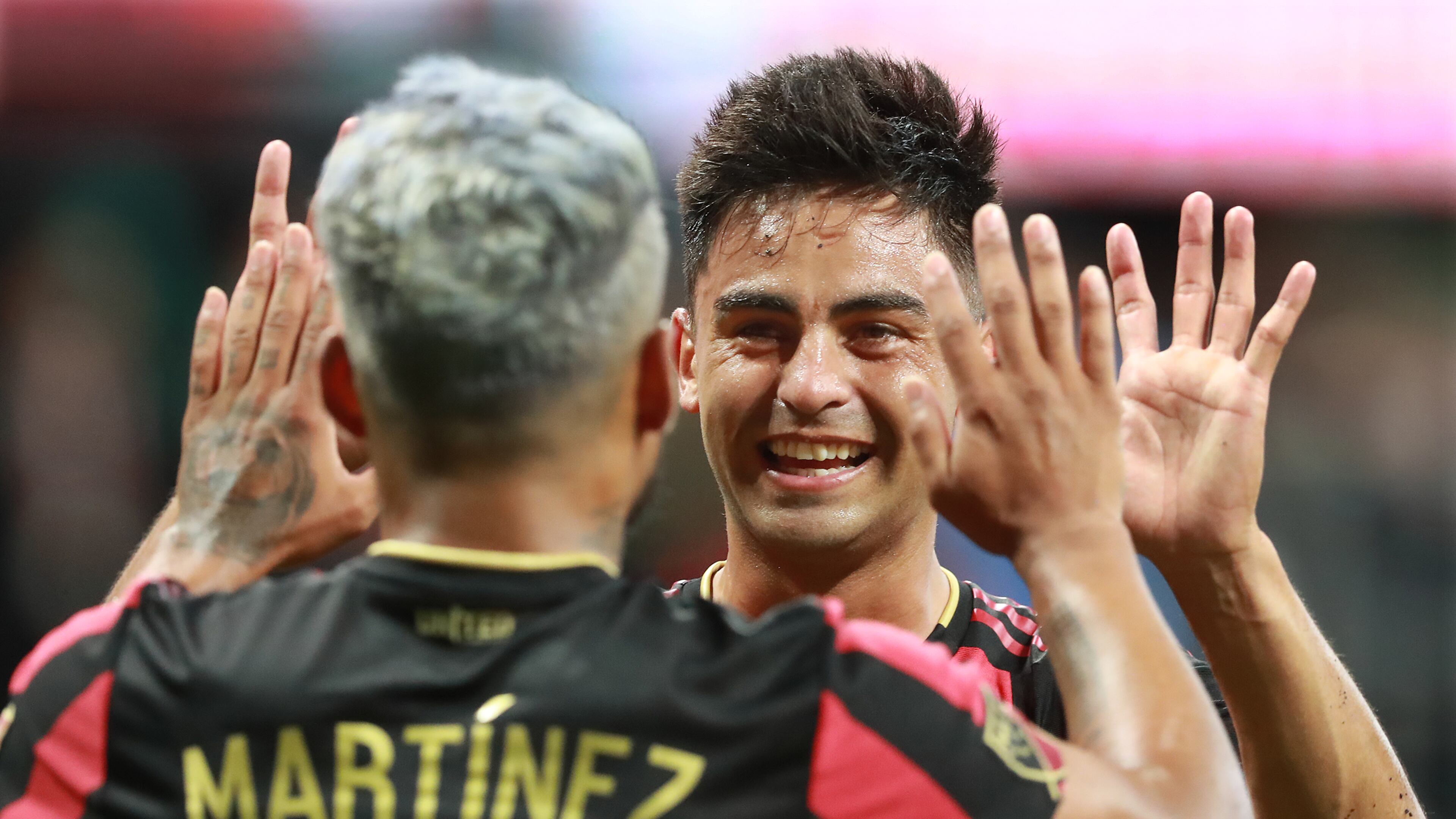 August 11, 2019 Atlanta: Atlanta United forward Josef Martinez gets a double high five from Pity Martinez after his first of two goals against New York City FC in their soccer match on Sunday, August 11, 2019, in Atlanta. Curtis Compton/ccompton@ajc.com