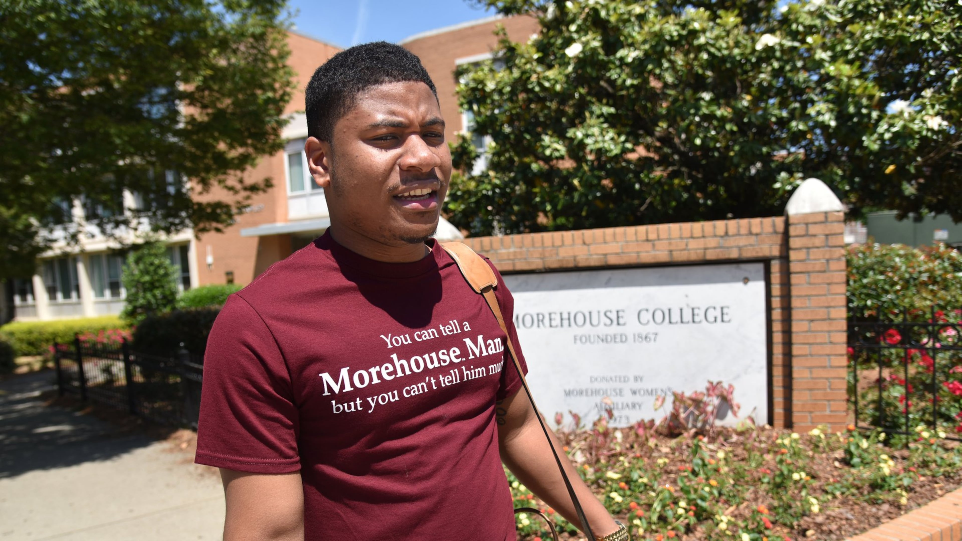 Keith Glass heads to the bookstore at Morehouse College on Tuesday, May 9, 2017. Glass graduated from high school almost last in his class, but eventually got into Morehouse and is now going to become a teacher. HYOSUB SHIN / HSHIN@AJC.COM