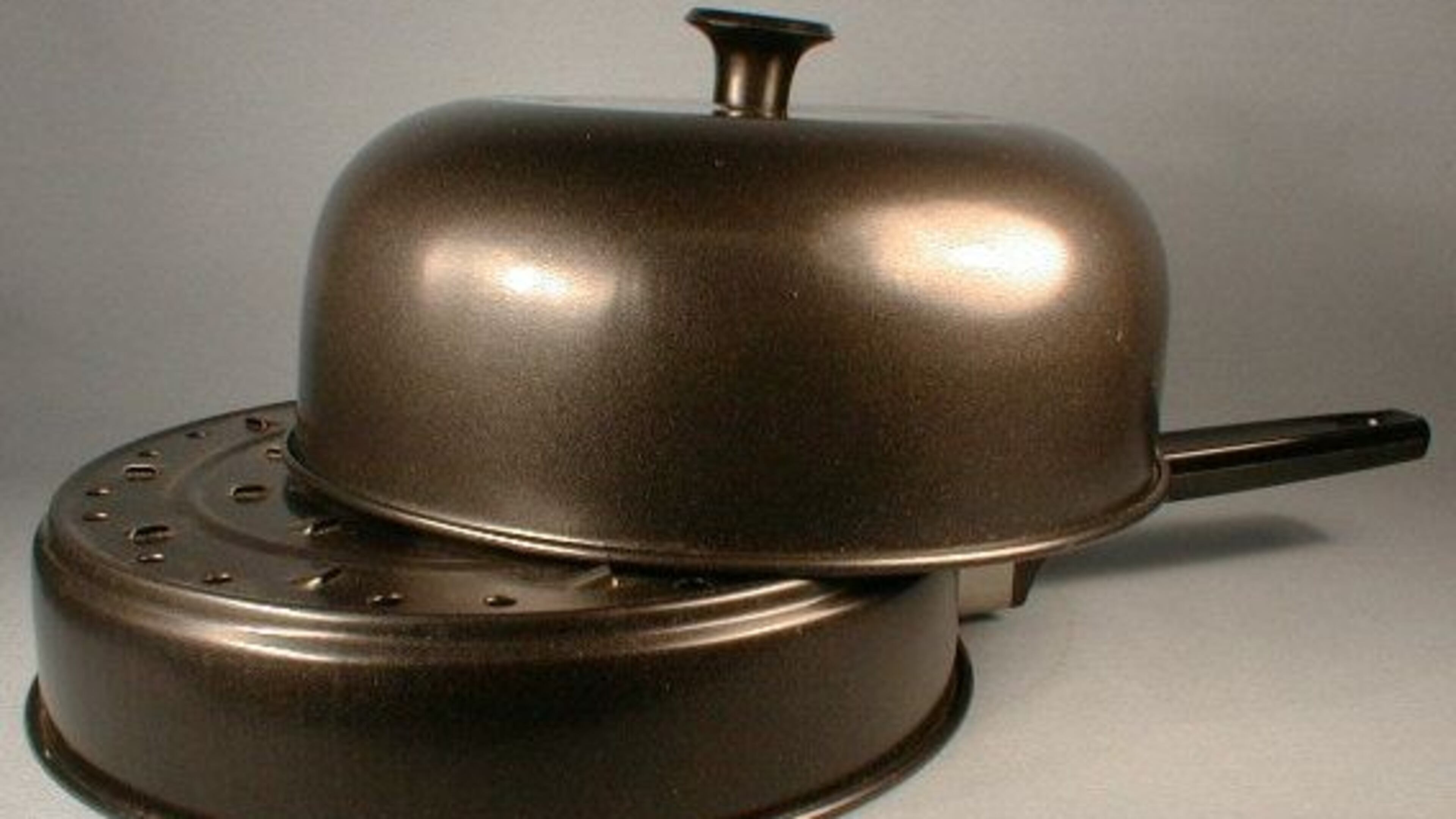 This domed stove-top potato baker also heats dinner rolls and other small items.