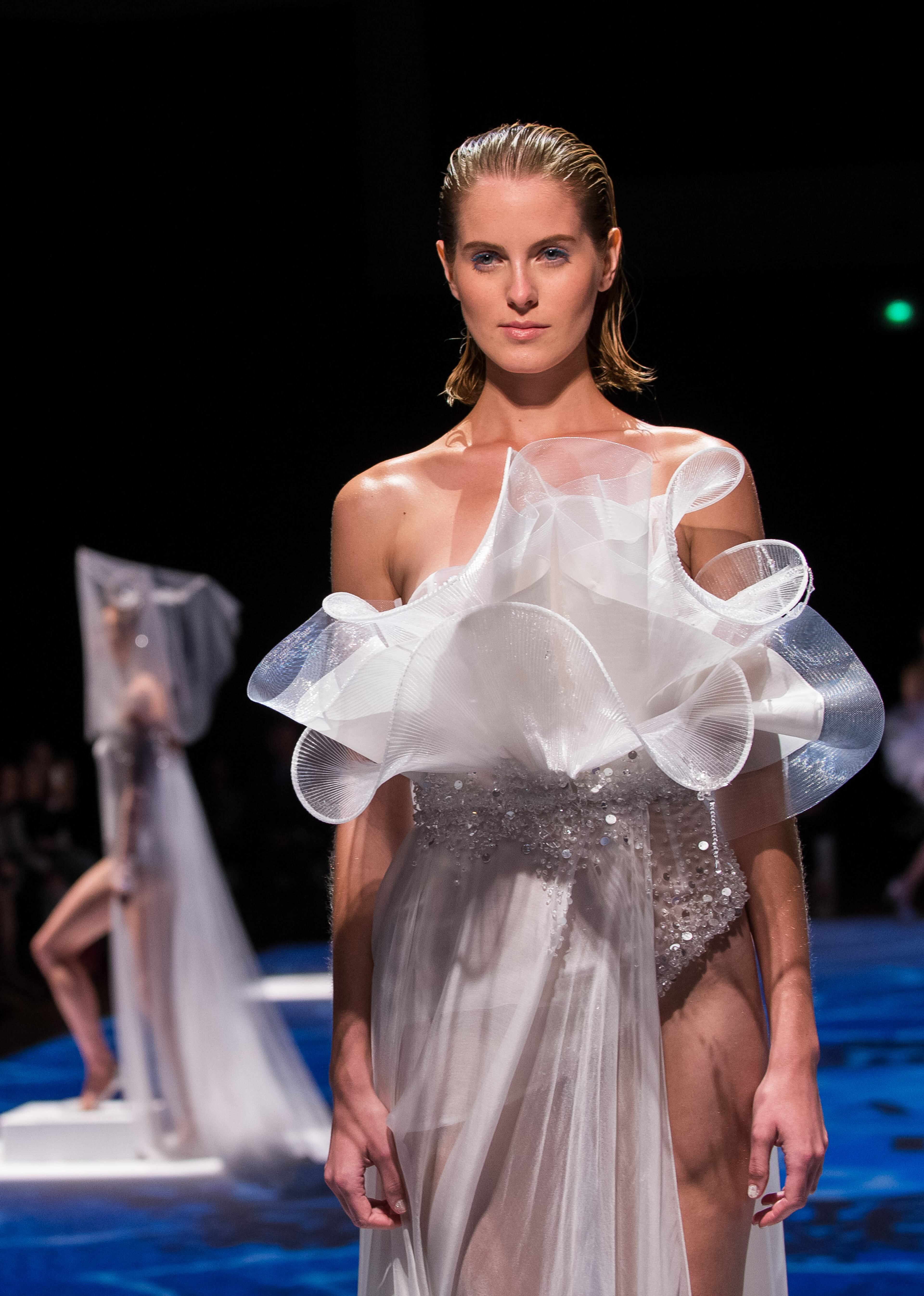 PARIS, FRANCE - JULY 09: A model walks the runway during the Lan YU show as part of Paris Fashion Week - Haute Couture Fall/Winter 2014-2015 at Grand Palais on July 9, 2014 in Paris, France. (Photo by Francois Durand/Getty Images)
