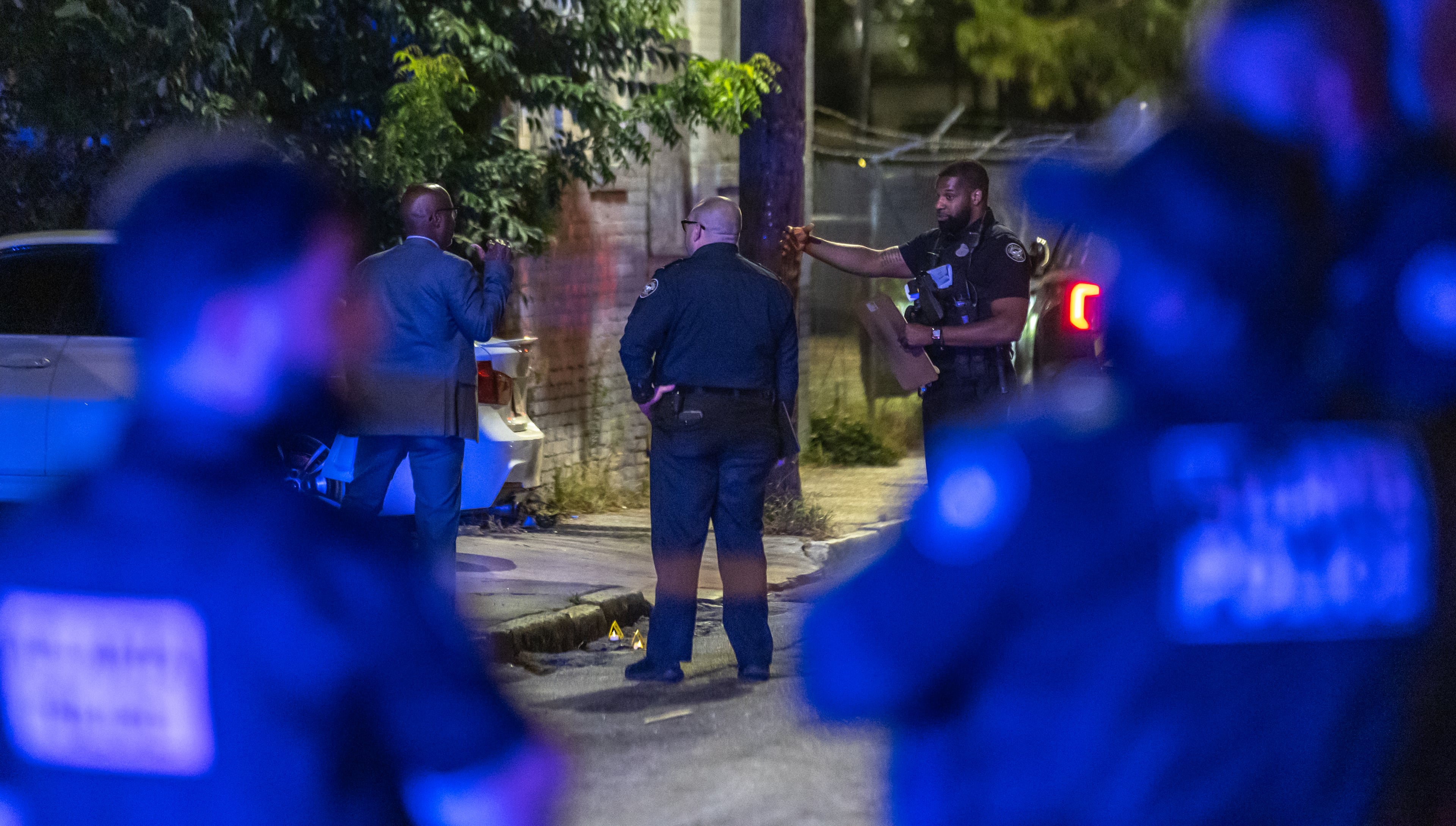 Atlanta police investigators process a crime scene on Wednesday, Sept. 11, 2024. Violent crime has decreased in Atlanta since 2022. (John Spink/AJC)