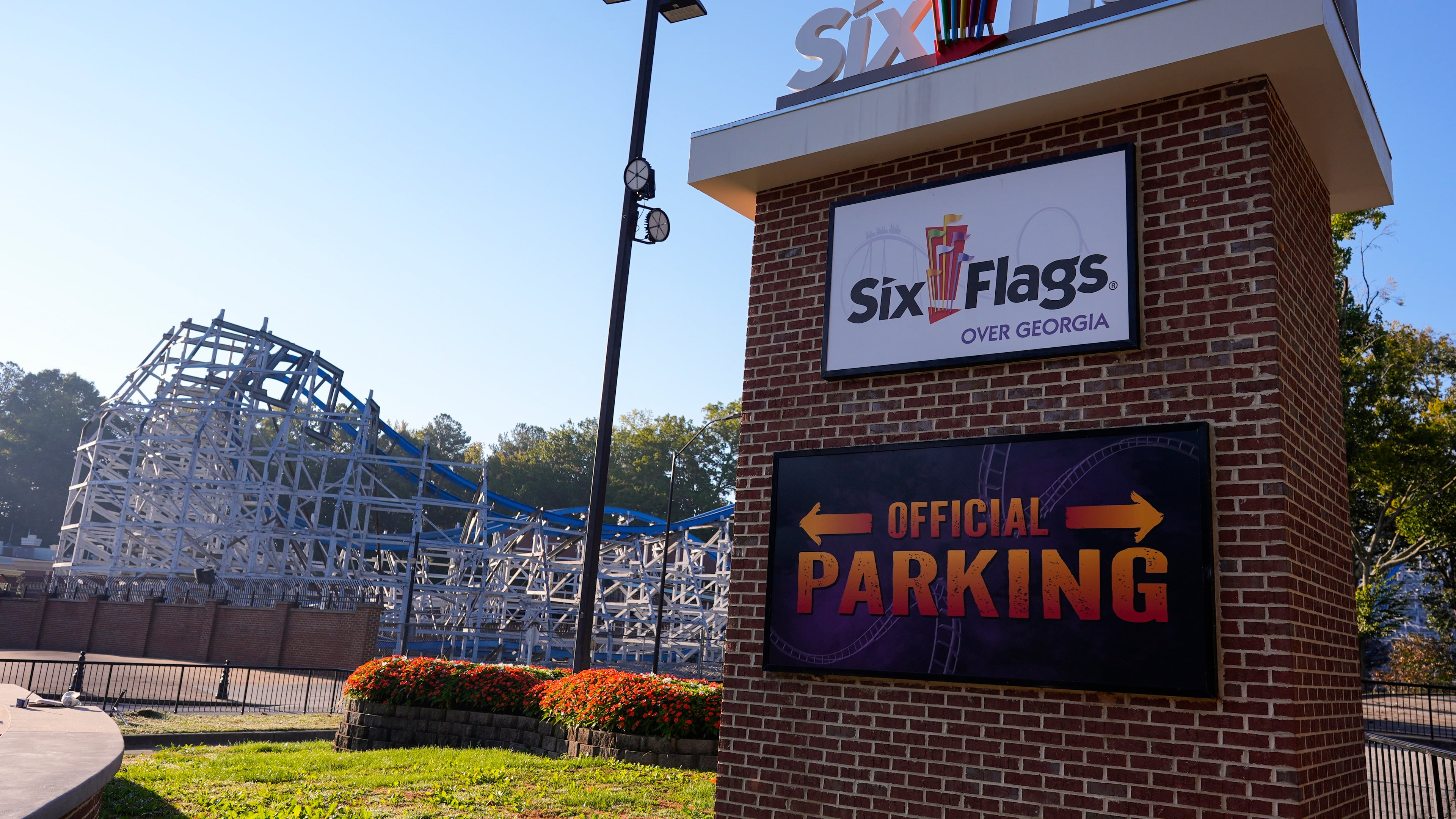 Attractions are seen at Six Flags Over Georgia, about 15 miles (24 kilometers) northwest of Atlanta, Tuesday, Oct. 13, 2026. (AP Photo/Mike Stewart)