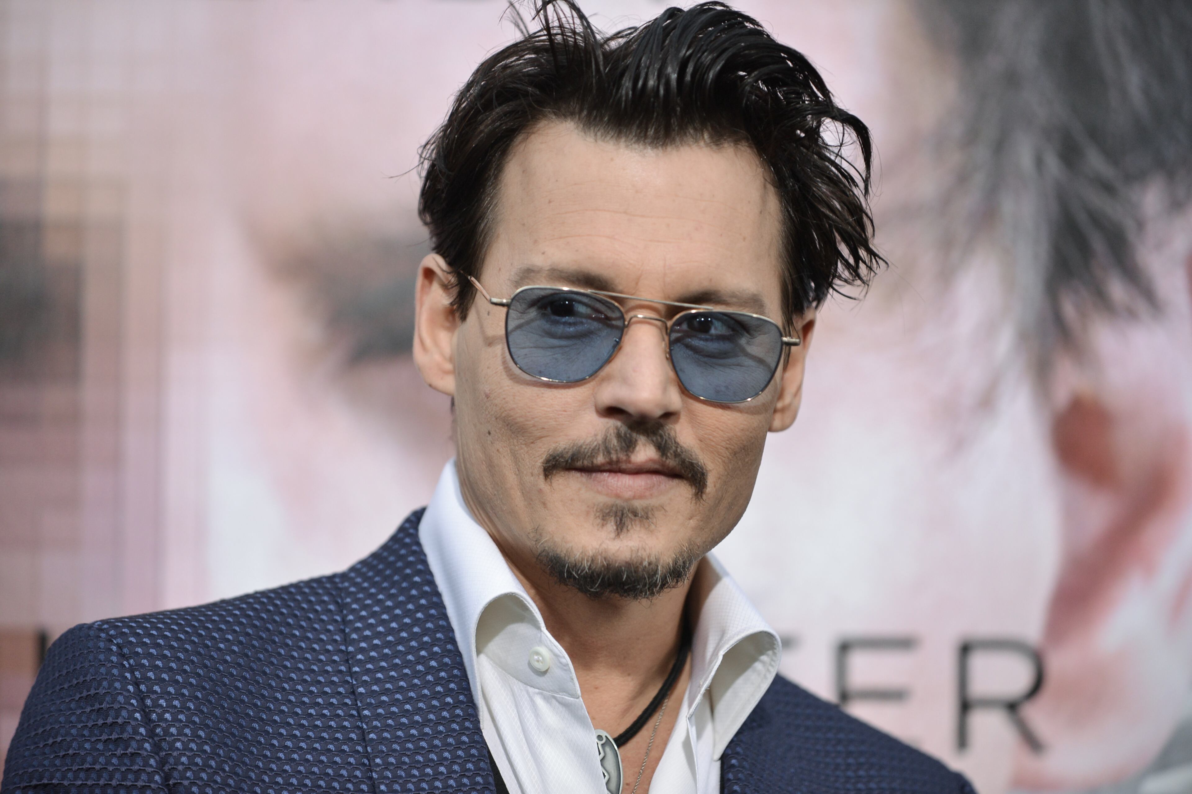 Johnny Depp arrives at the LA Premiere Of "Transcendence" on Thursday, April 10, 2014, in Los Angeles.