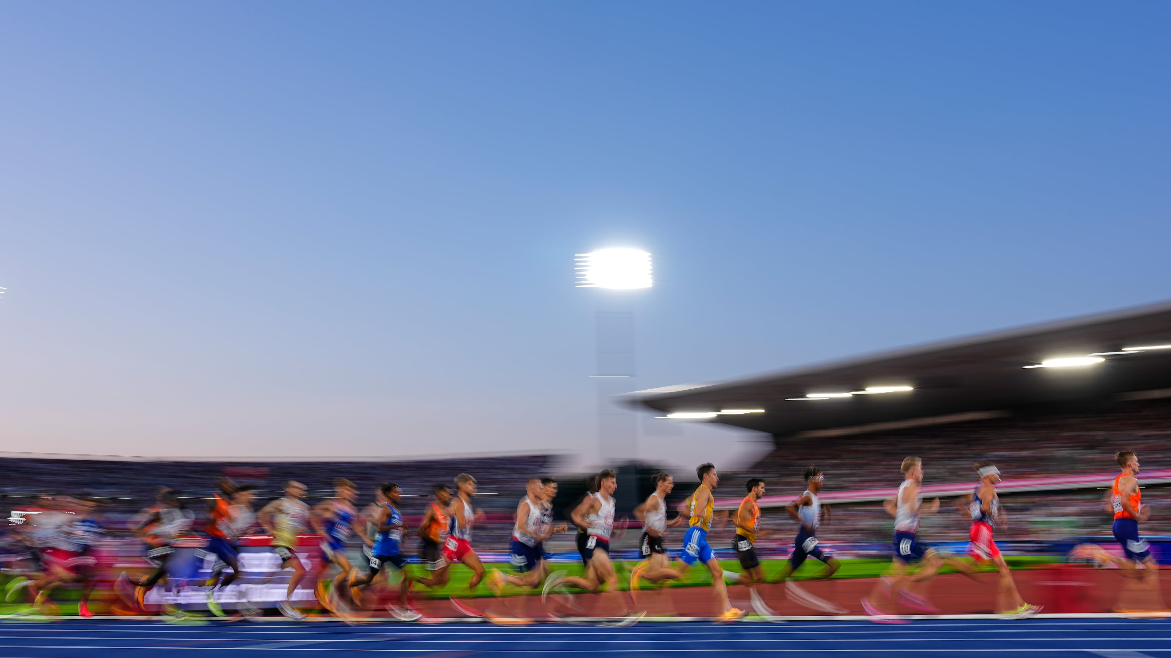 Athletes race in the men's 10,000 meters final at the European Athletics Championships in Birmingham, England, Saturday, Aug. 15, 2026. (AP Photo/Petr David Josek)