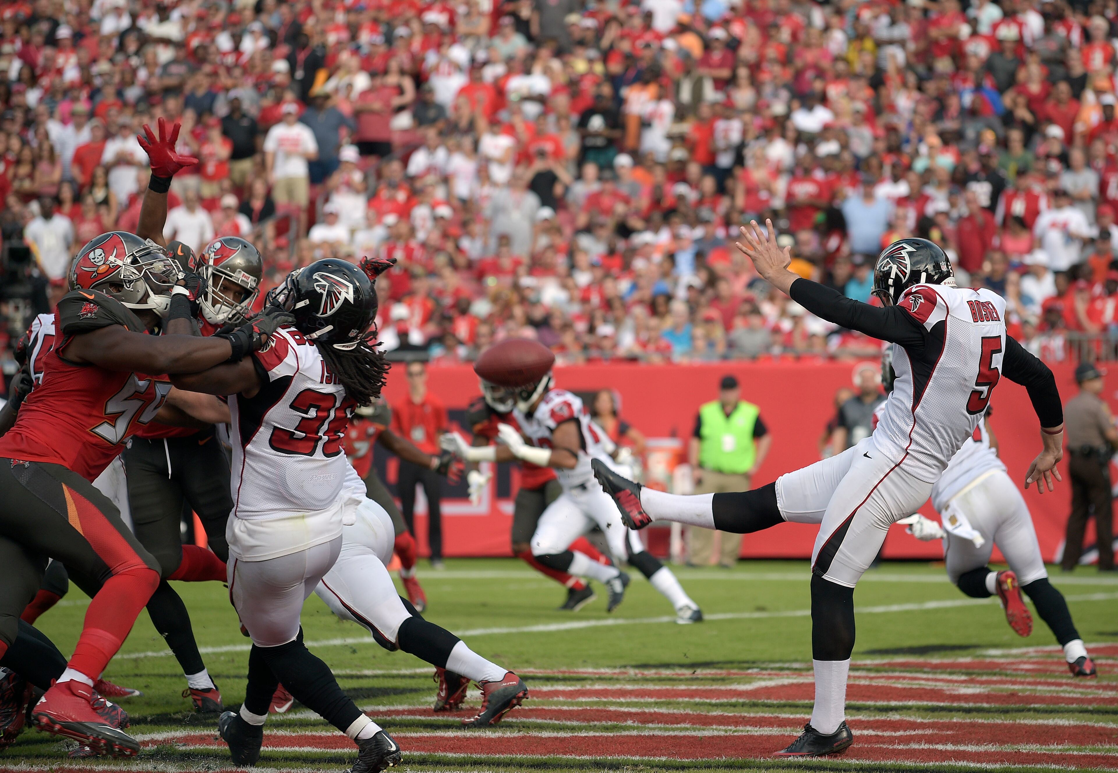 Atlanta Falcons punter Matt Bosher (5) punts from the end zone against the Tampa Bay Buccaneers during the third quarter of an NFL football game Sunday, Dec. 6, 2015, in Tampa, Fla. (AP Photo/Phelan M. Ebenhack)