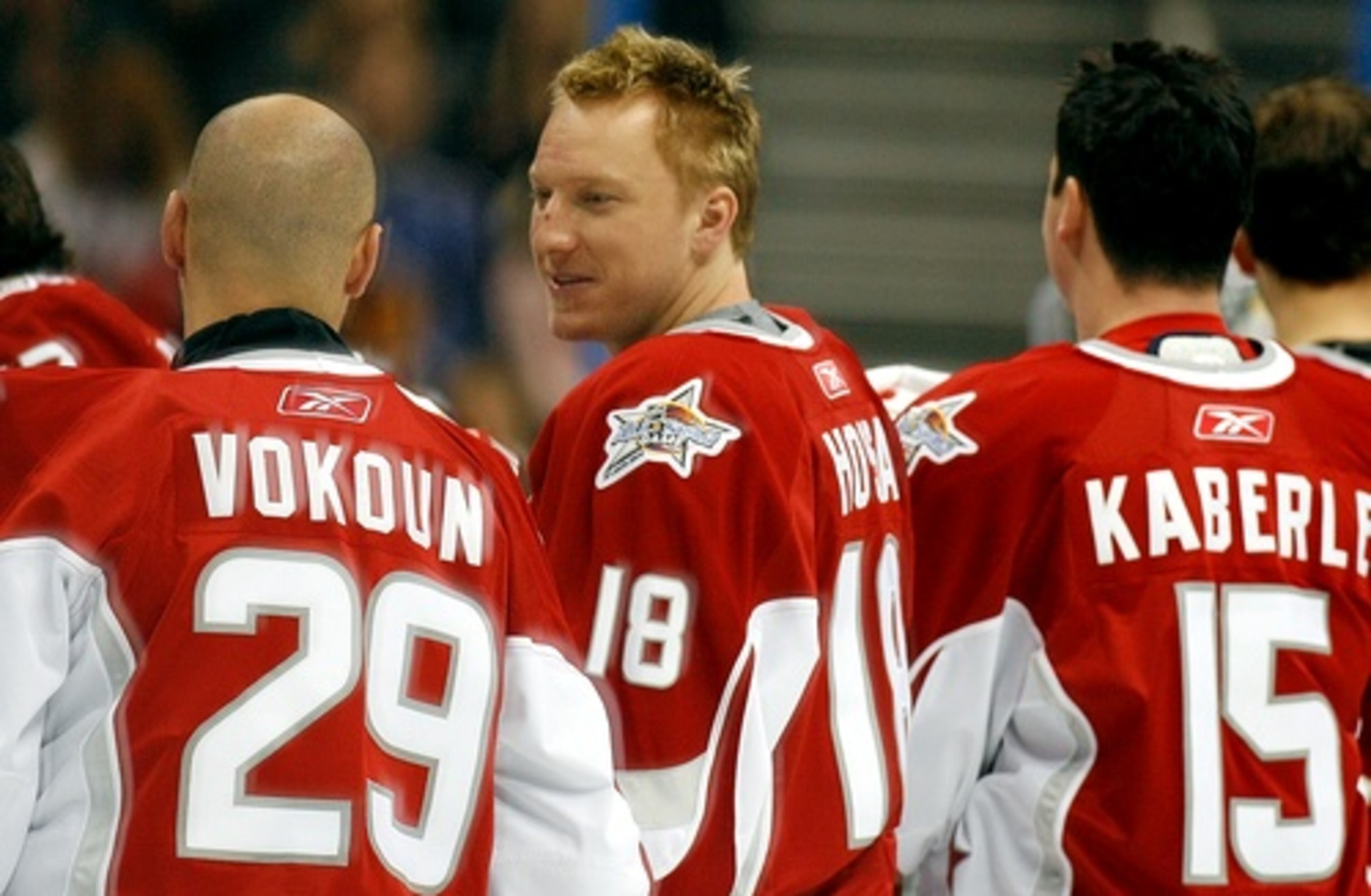 Thrashers forward Marian Hossa (18) joins his Eastern conference teammates including Tomas Vokoun (29) the morning practice session.