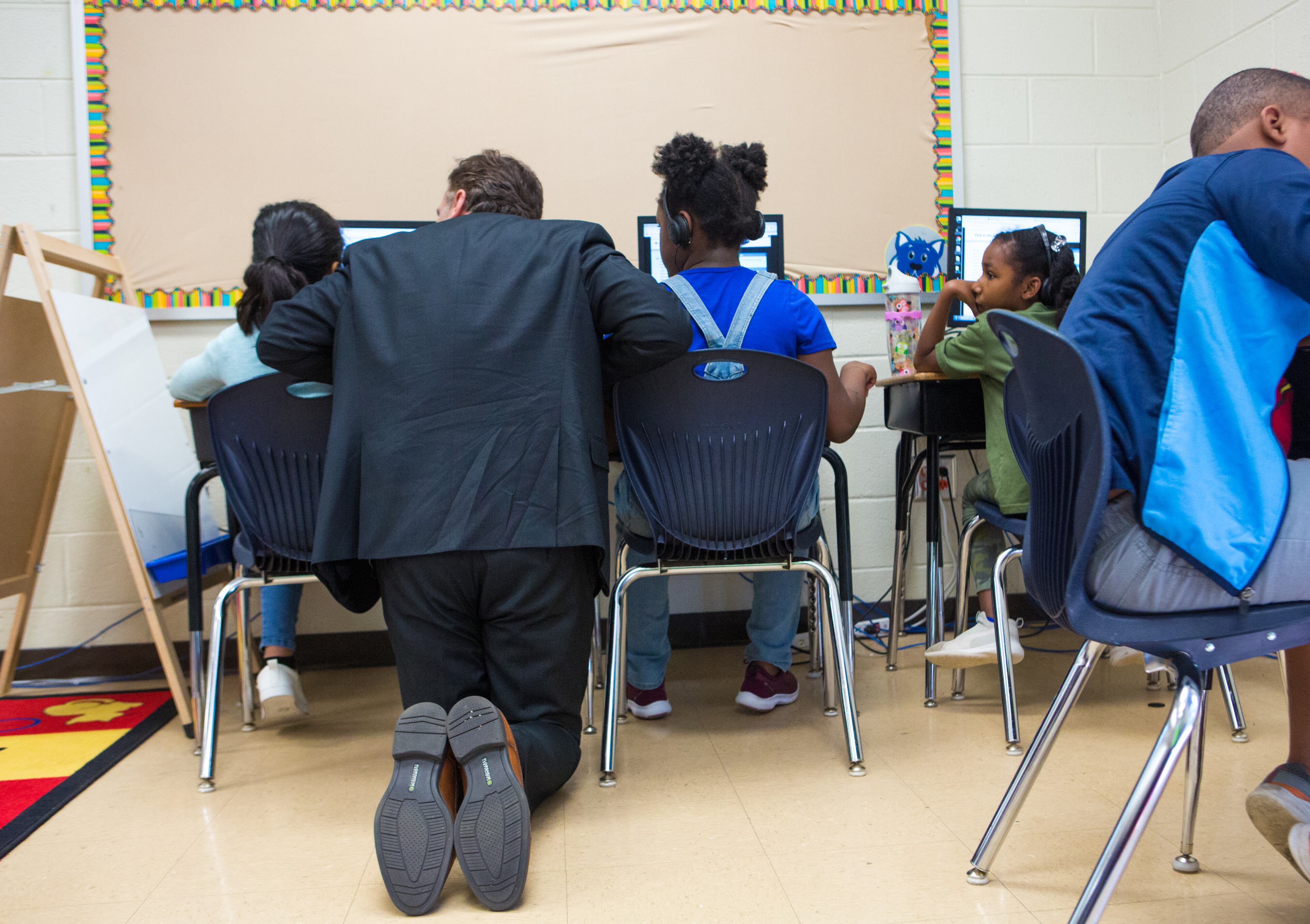 Incoming Fulton County Schools Superintendent Mike Looney interacts with students as he tours Evoline C. West Elementary School during their summer school program in Fairburn, Ga., on Thursday, June 13, 2019. Looney's first official day on the job is Monday, June 17. Starting Monday, June 17, Looney will lead Georgia's fourth largest school district, which has a general fund budget of more than $1 billion. (Casey Sykes for The Atlanta Journal-Constitution)