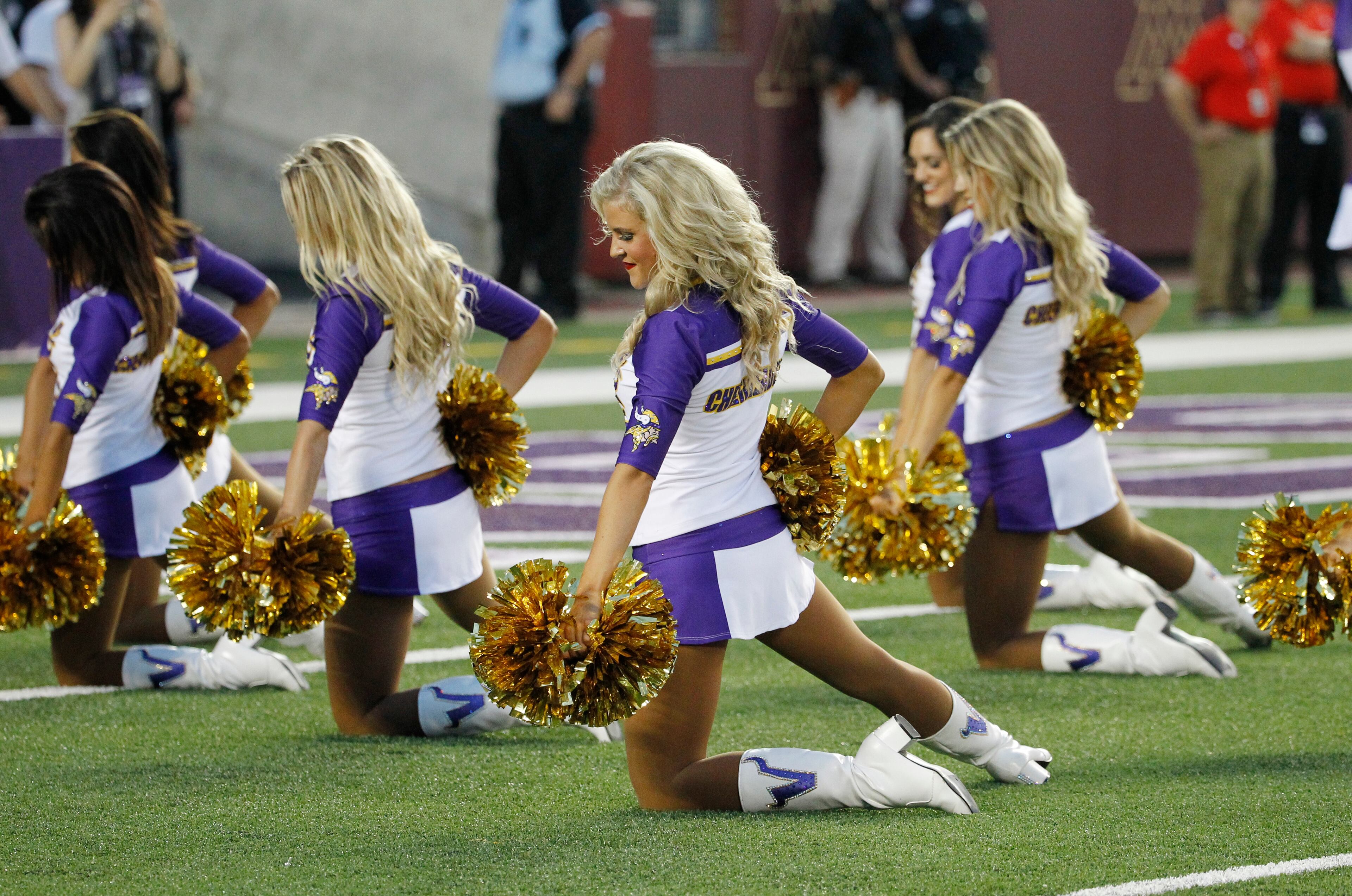Minnesota Vikings cheerleaders perform during the first half of an NFL preseason football game against the Arizona Cardinals, Saturday, Aug. 16, 2014, in Minneapolis. (AP Photo/Ann Heisenfelt)