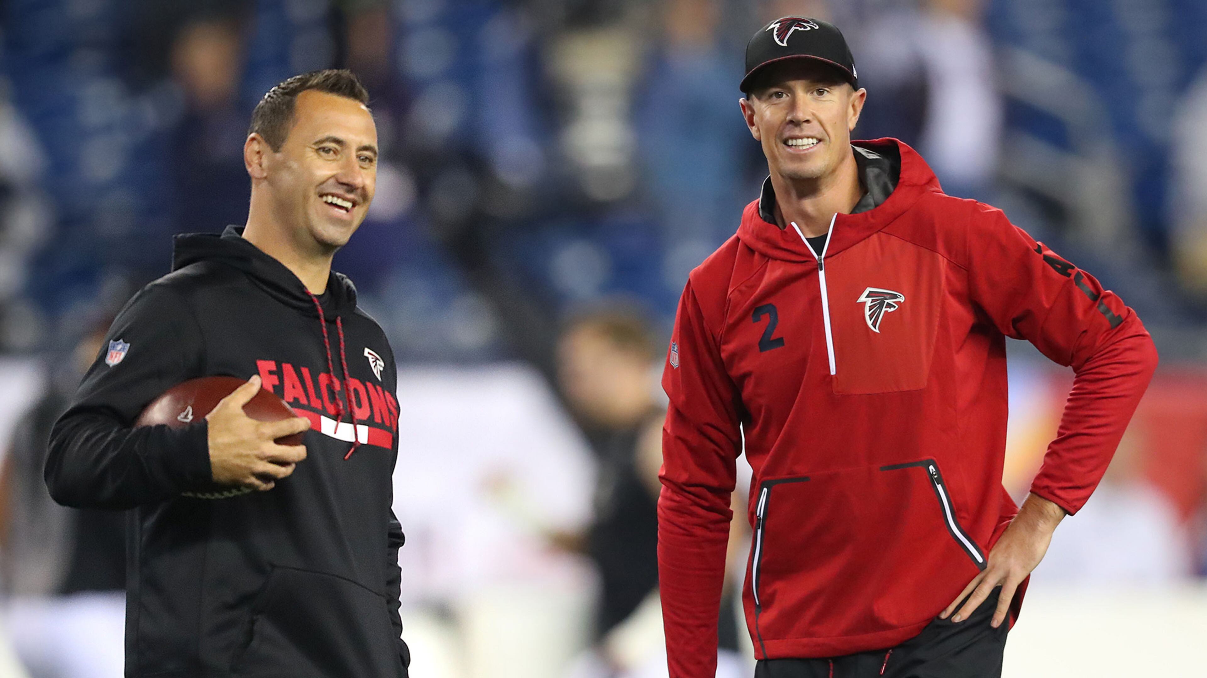 Atlanta Falcons offensive coordinator Steve Sarkisian, left, and quarterback Matt Ryan share a laugh while preparing to play the New England Patriots on October 22, 2017, at Gillette Stadium in Foxborough, Mass. (Curtis Compton/Atlanta Journal-Constitution/TNS)
