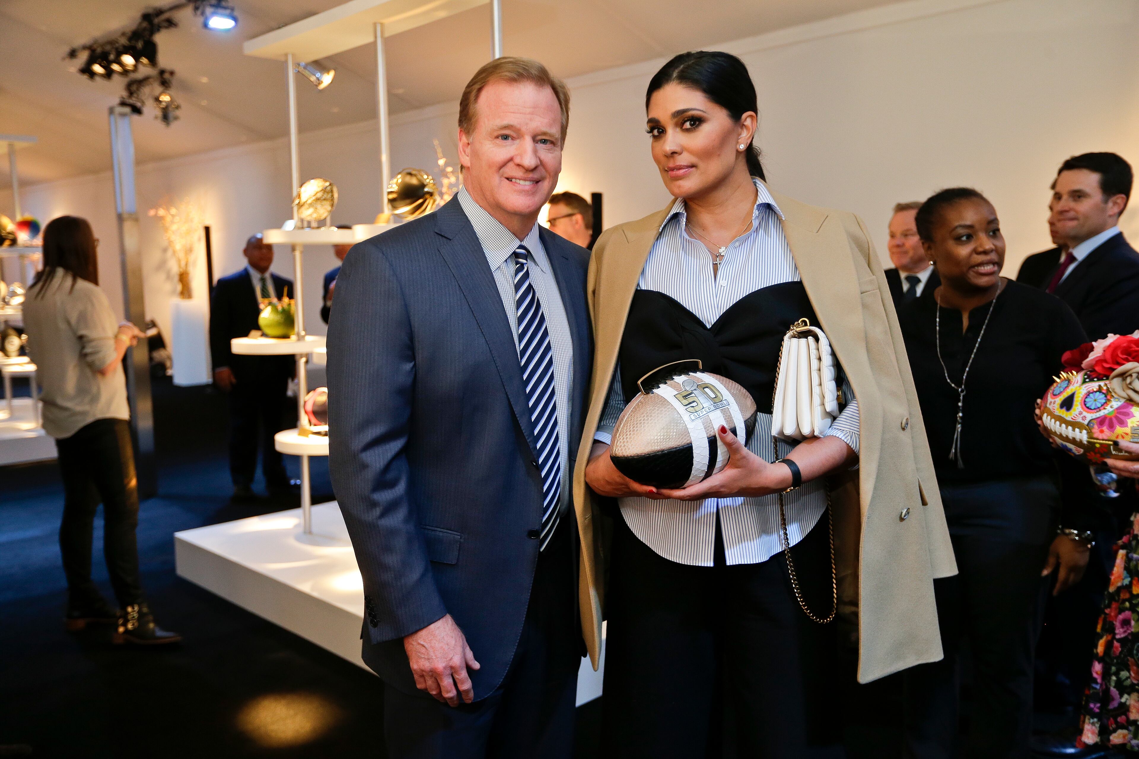 NFL Commissioner Roger Goodell, left, and fashion designer Rachel Roy pose at the unveiling of the CFDA Footballs Wednesday, Jan. 20, 2016, at the NFL headquarters in New York. In celebration of Super Bowl 50 and in support of the NFL Foundation, the NFL and the Council of Fashion Designers of America have collaborated on 50 Bespoke Designer Footballs created by CFDA Members. (AP Photo/Frank Franklin II)