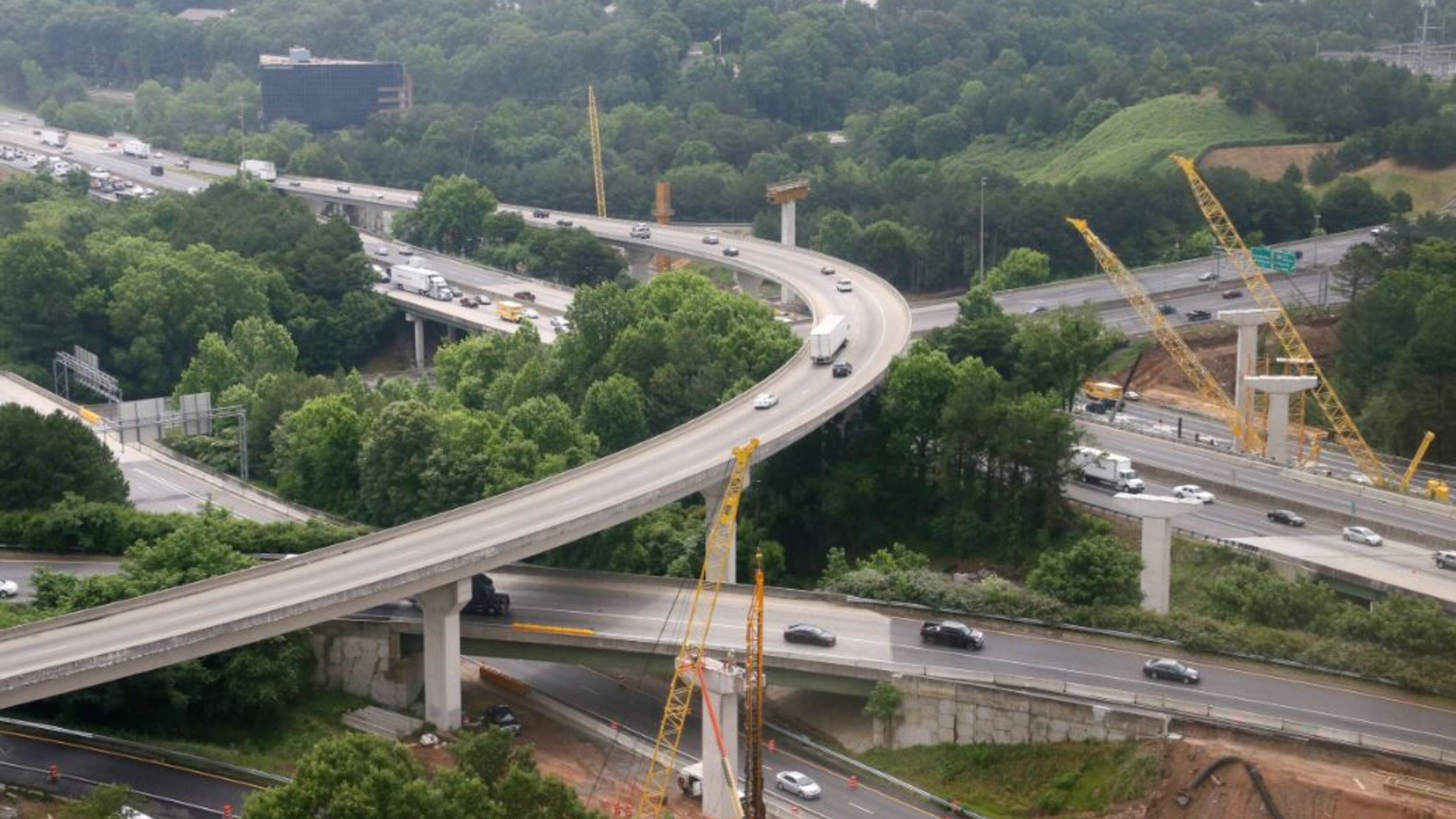 Express lane construction is underway at the I285 and I75 interchange. View showing the I285 (running top left to bottom right) and I75 interchange near the Sun Trust Park construction site. BOB ANDRES / BANDRES@AJC.COM