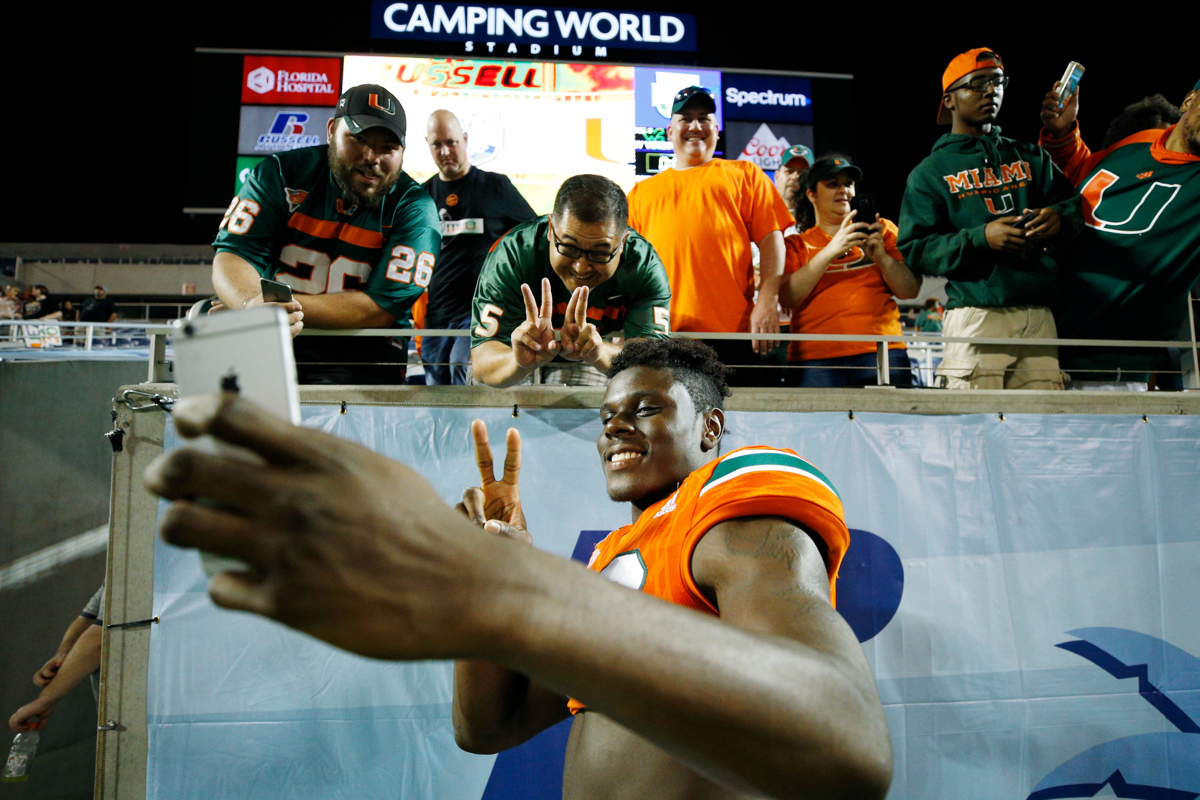 ORLANDO, FL - DECEMBER 28: David Njoku #86 of the Miami Hurricanes celebrates with fans following the Russell Athletic Bowl against the West Virginia Mountaineers at Camping World Stadium on December 28, 2016 in Orlando, Florida. Miami defeated West Virginia 31-14. (Photo by Joe Robbins/Getty Images)