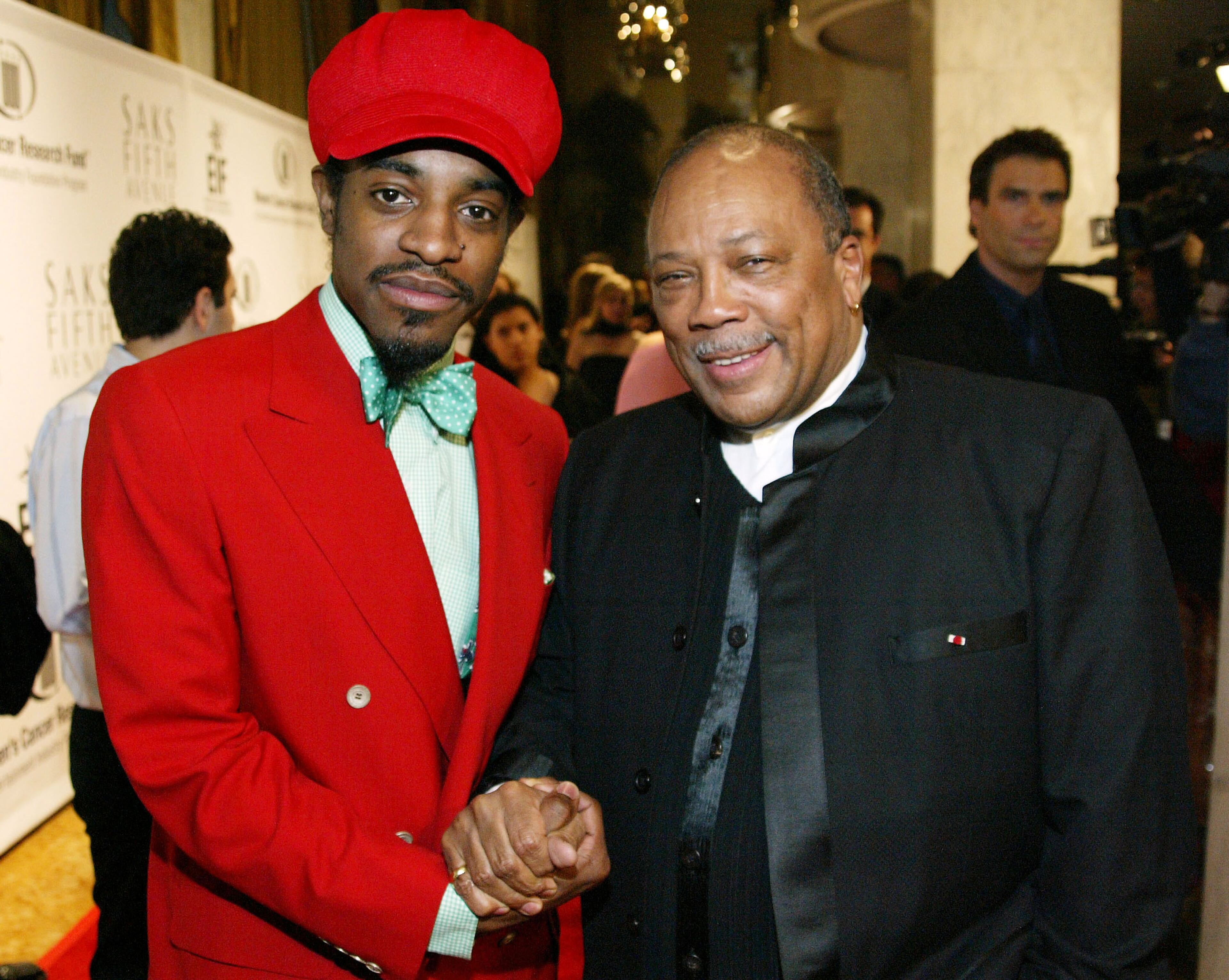 Composer Quincy Jones and Andre 3000 arrive at the "Saks Fifth Avenue's Unforgettable Evening" at the Regent Beverly Wilshire on March 1, 2004 in Beverly Hills, California. Nicole Kidman was honoured by the Women's Cancer Research Fund, a program of the Entertainment Industry Foundation (EIF).