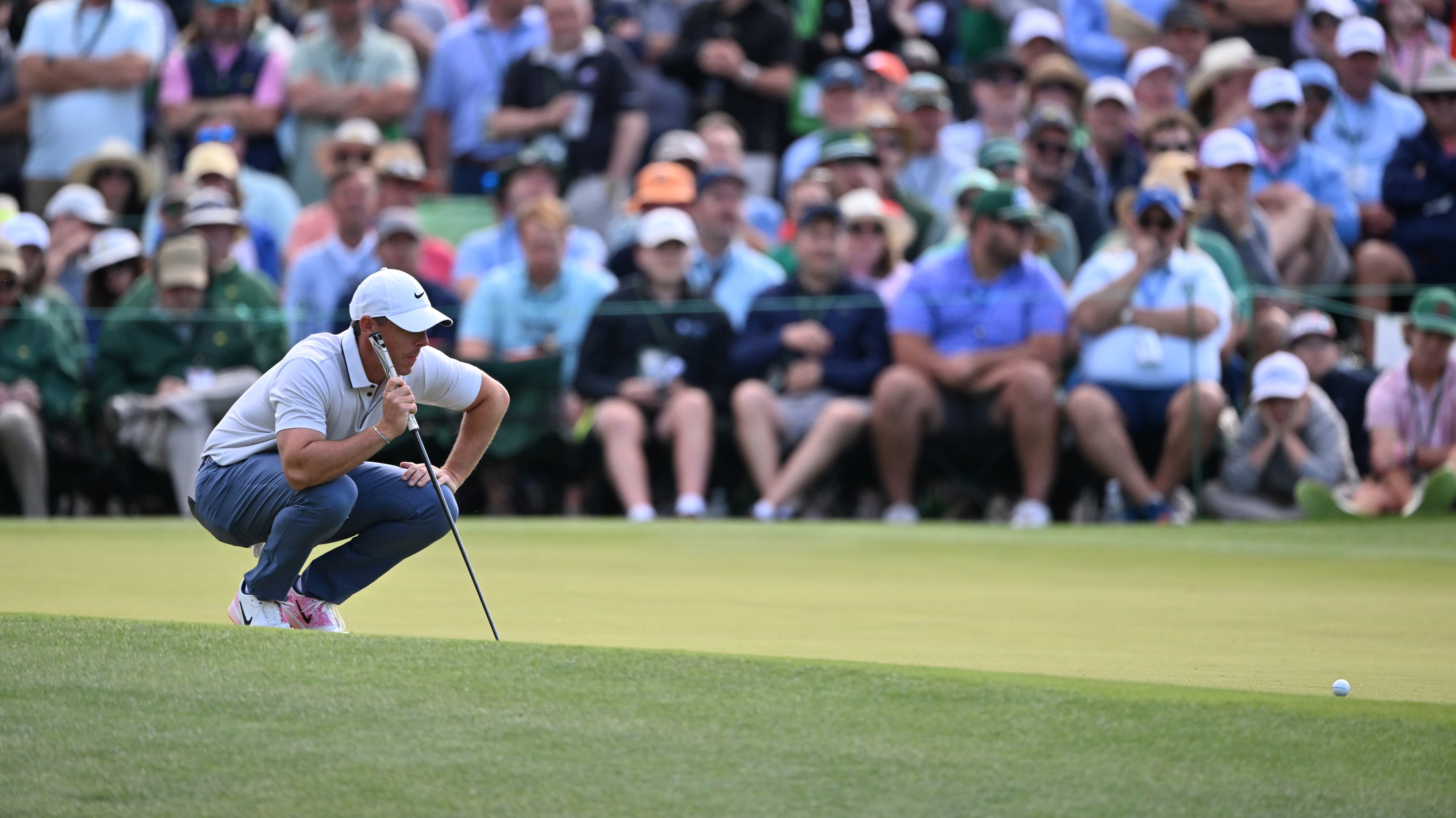 Rory McIlroy lines up putt on tenth green during third round of the Masters golf tournament, at Augusta National Golf Club, Saturday, April 12, 2025, in Augusta, Ga. (Hyosub Shin / AJC)